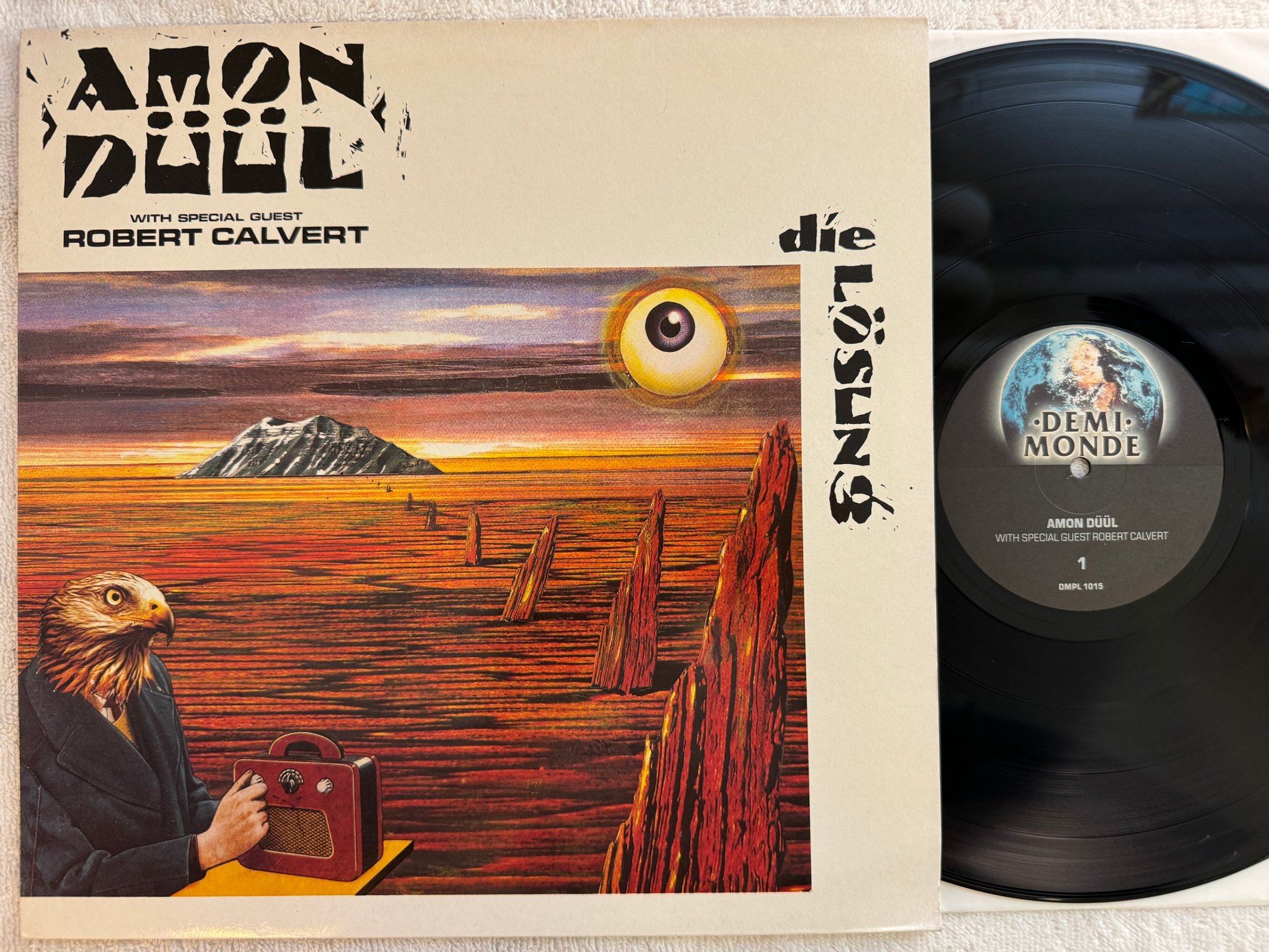 Omslagsbild för skivan AMON DÜÜL Die Lösung LP -89 UK DEMI MONDE DMLP 1015