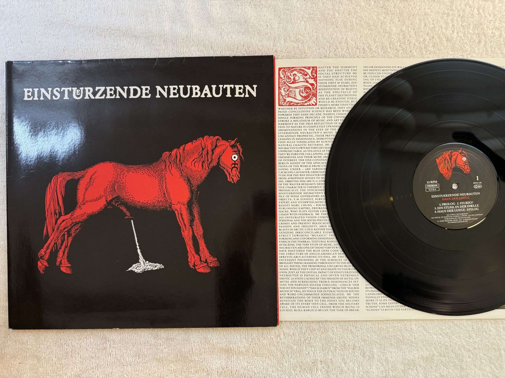 Omslagsbild för skivan EINSTUERZENDE NEUBAUTEN Haus Der Luege LP -89 GER rough trade RTD 126