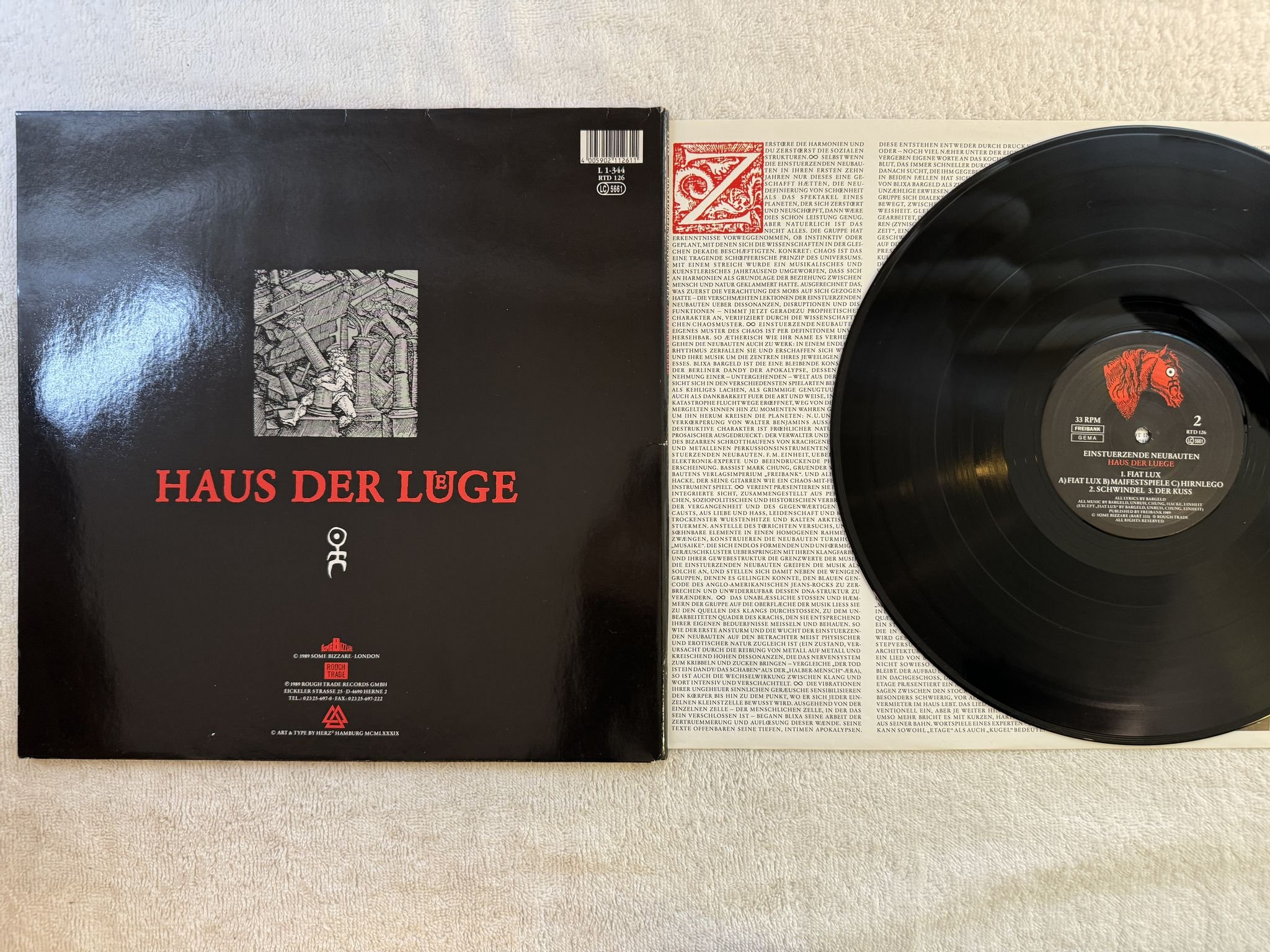 Omslagsbild för skivan EINSTUERZENDE NEUBAUTEN Haus Der Luege LP -89 GER rough trade RTD 126