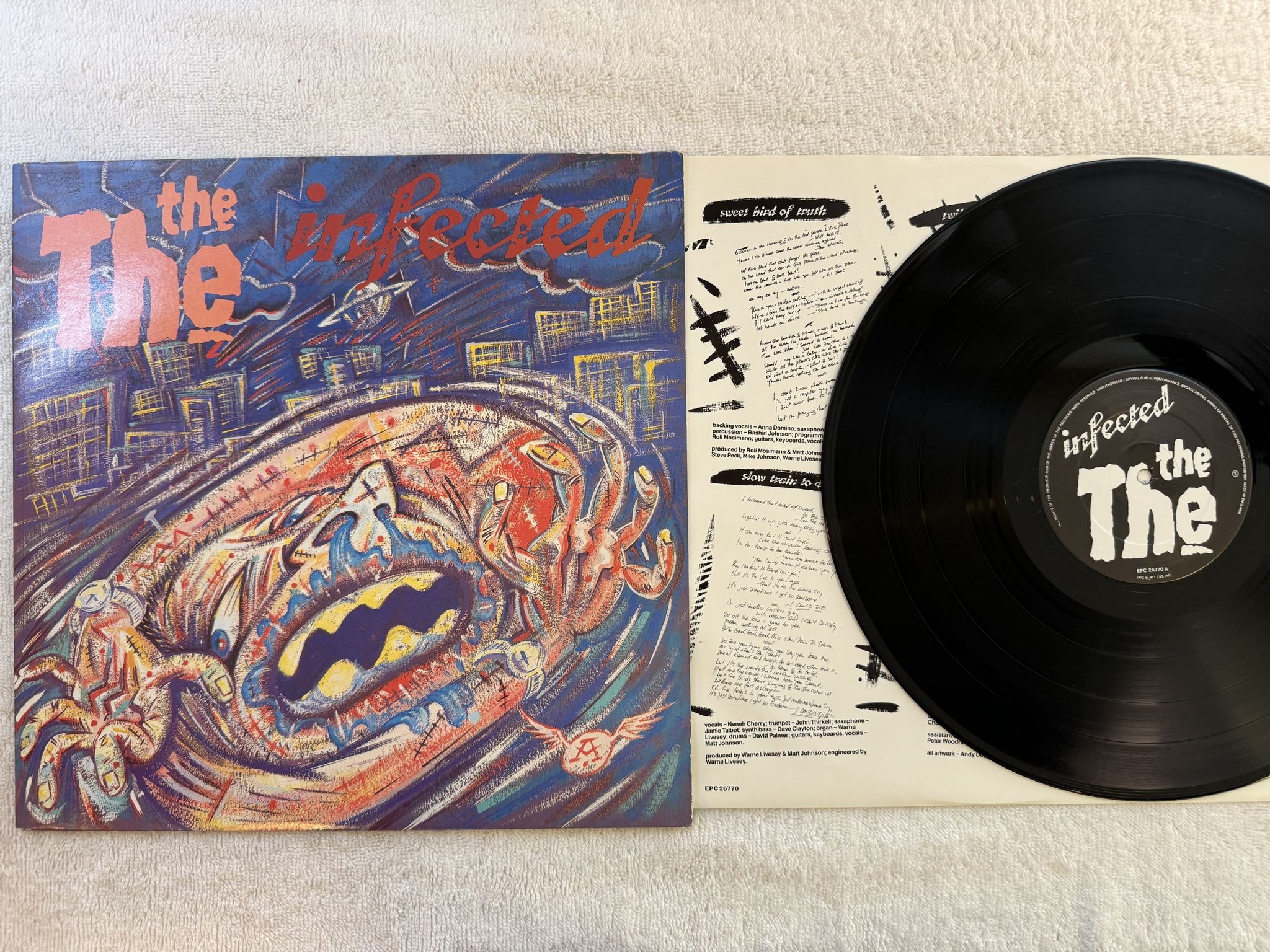 Omslagsbild för skivan THE THE Infected LP -86 UK epic EPC 26770