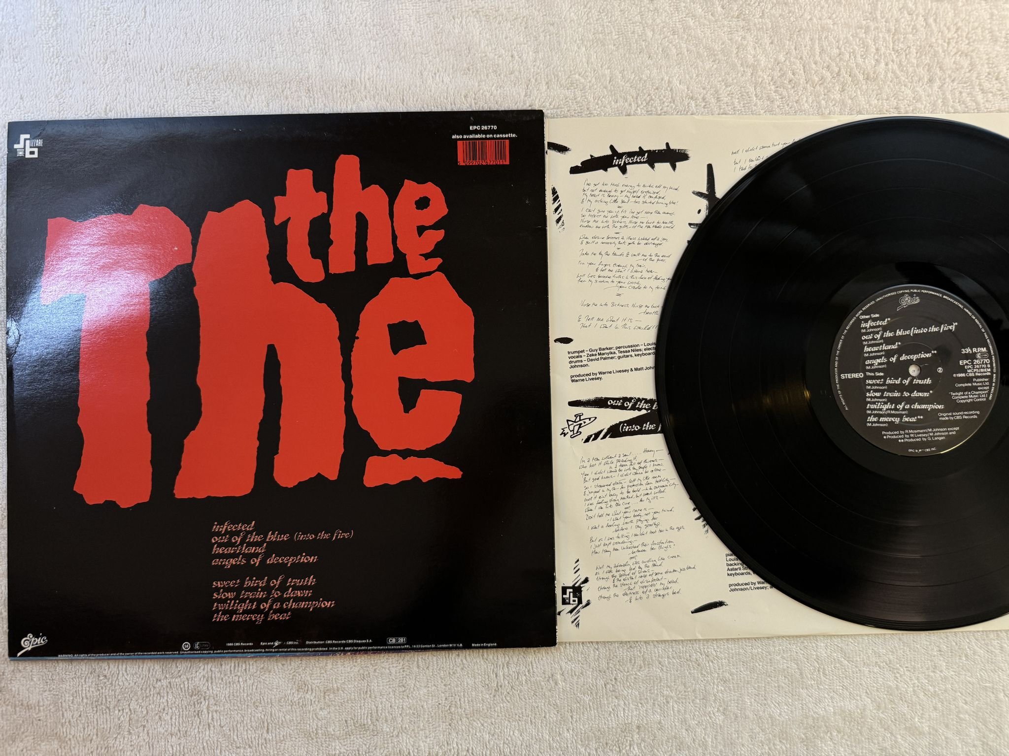 Omslagsbild för skivan THE THE Infected LP -86 UK epic EPC 26770