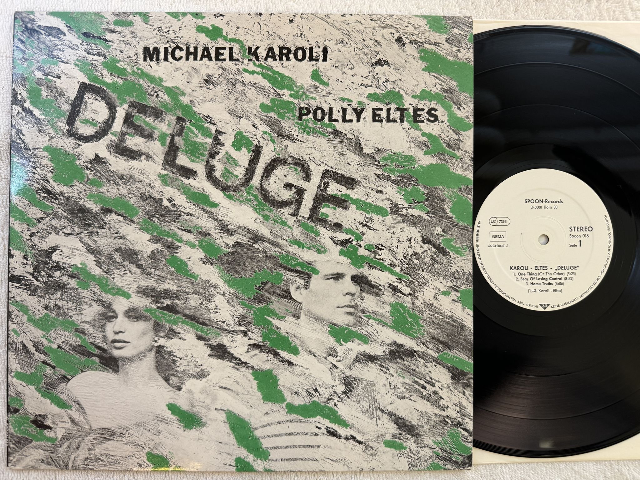 Omslagsbild för skivan MICHAEL KAROLI & POLLY ELTES Deluge LP 84 Ger SPOON 016 * Electronic dub rock *