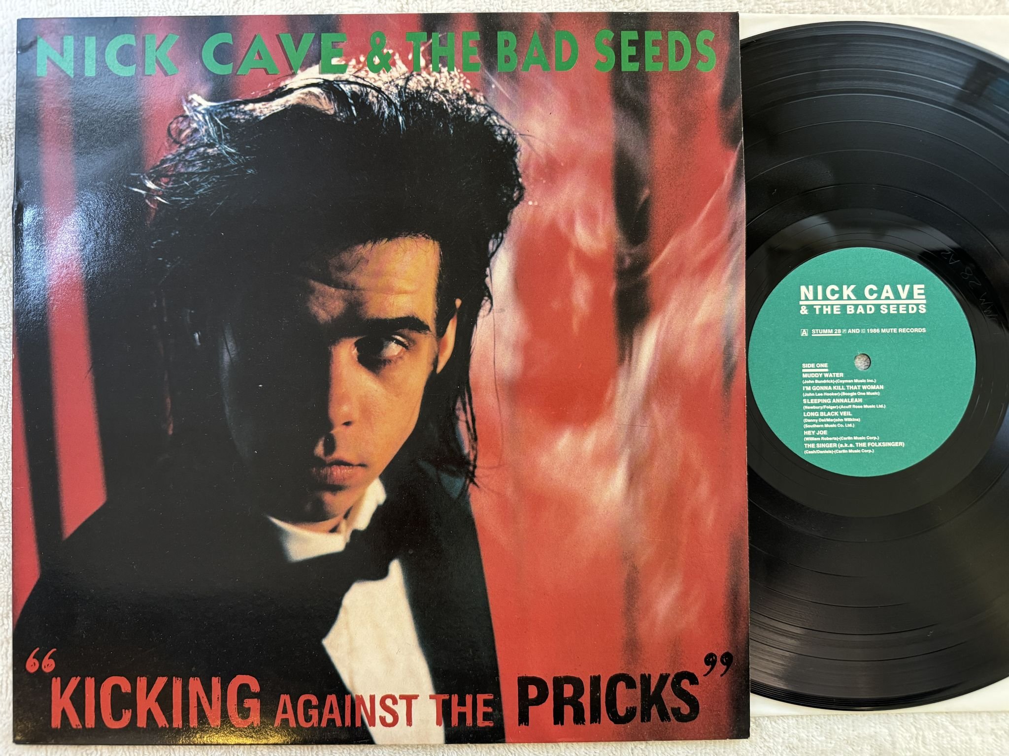 Omslagsbild för skivan NICK CAVE & THE BAD SEEDS kicking against the pricks LP -86 UK MUTE STUMM 28