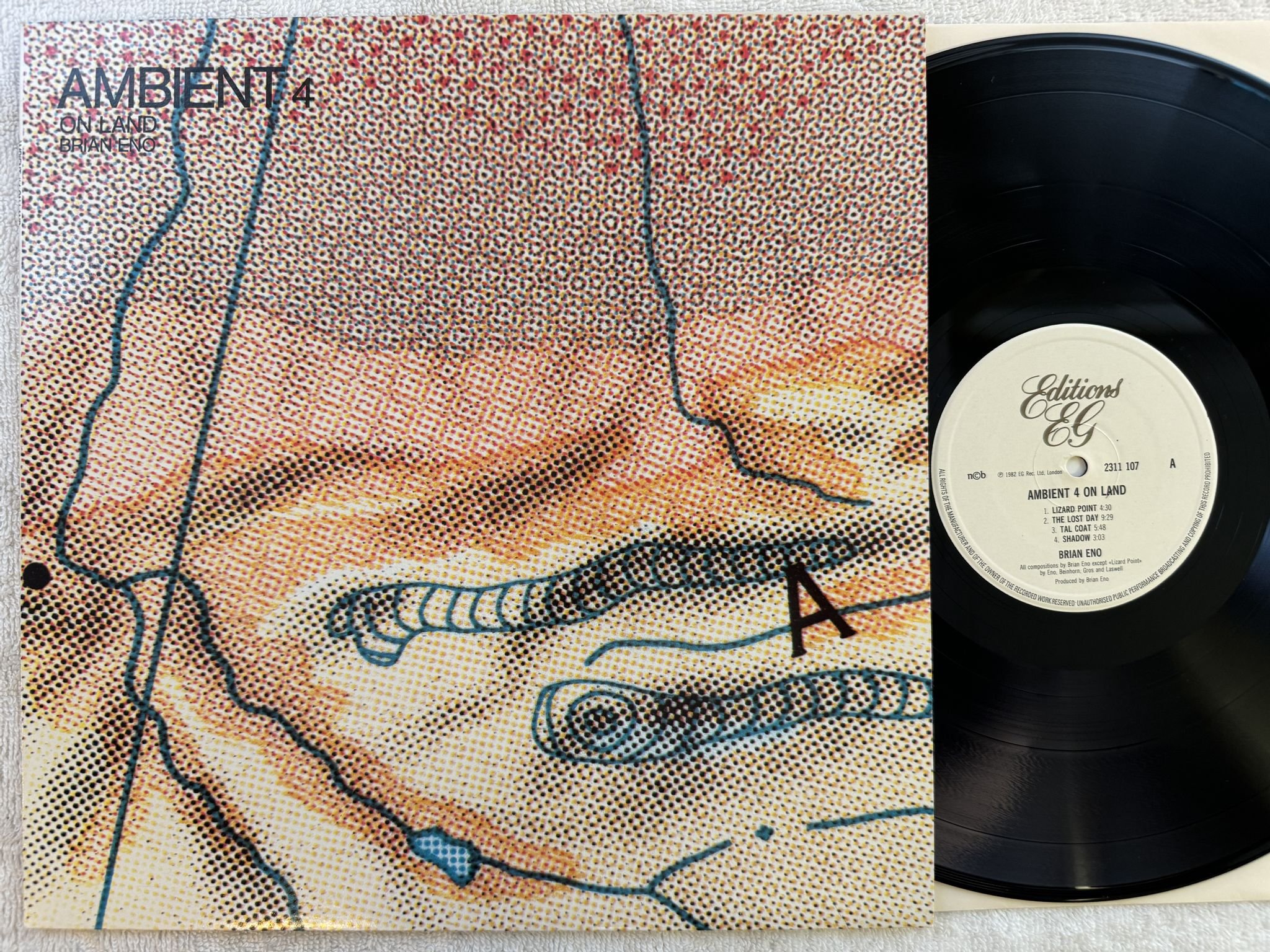 Omslagsbild för skivan BRIAN ENO Ambient 4 on land LP -80 ncb Editions EG 2311 107