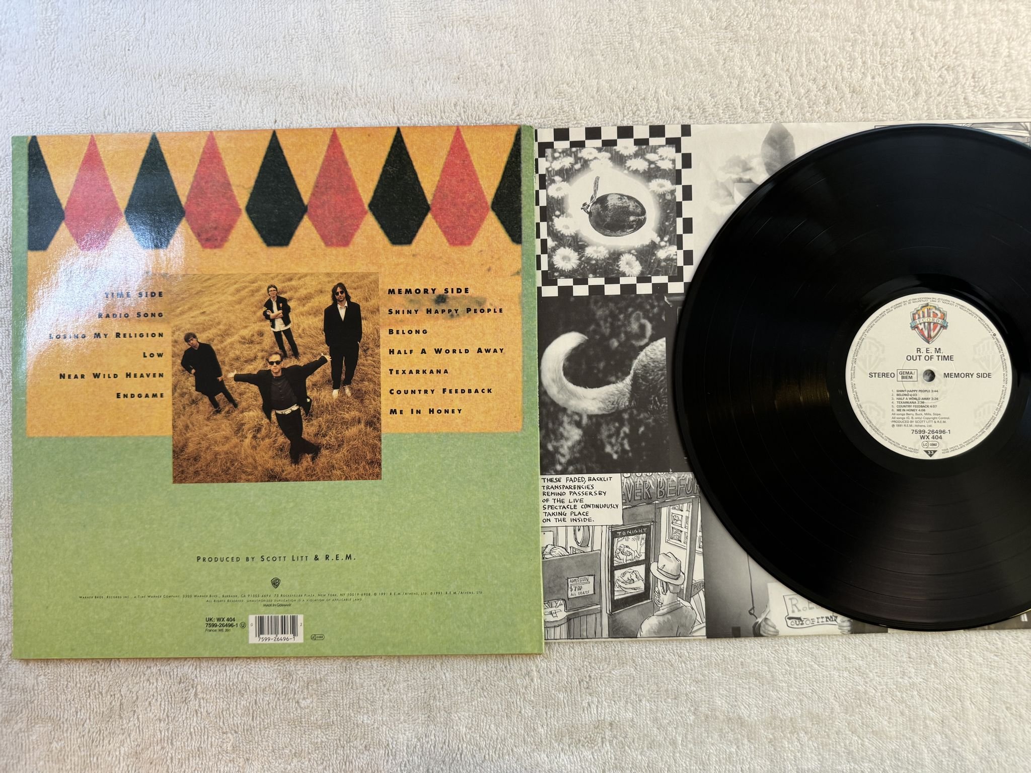 Omslagsbild för skivan R.E.M. out of time LP -91 Hol WARNER BROS 7599 26496 1