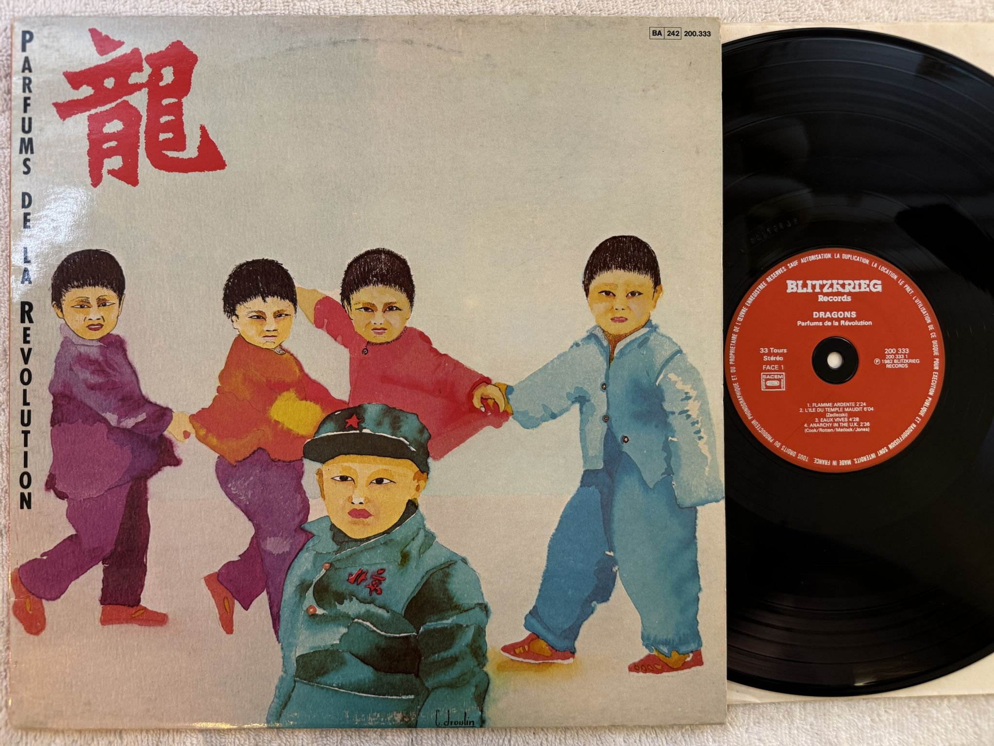 Omslagsbild för skivan DRAGONS Parfums De La Revolution LP -82 Fra BLITZKRIEG 200333 *** PUNK ***