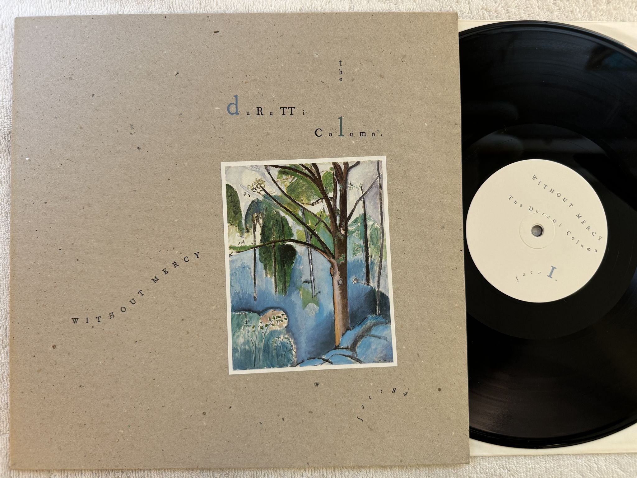 Omslagsbild för skivan THE DURUTTI COLUMN without mercy LP -84 FACTORY fact 84