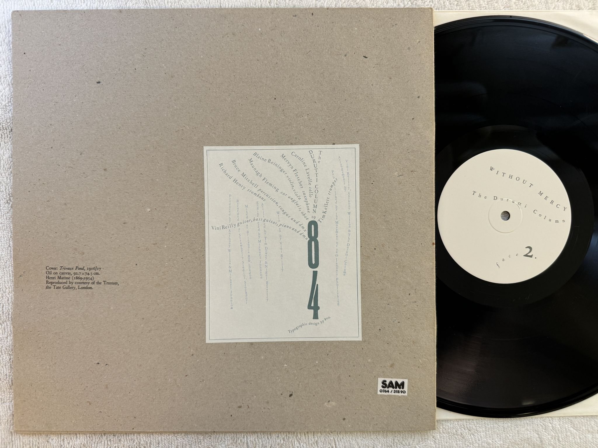 Omslagsbild för skivan THE DURUTTI COLUMN without mercy LP -84 FACTORY fact 84