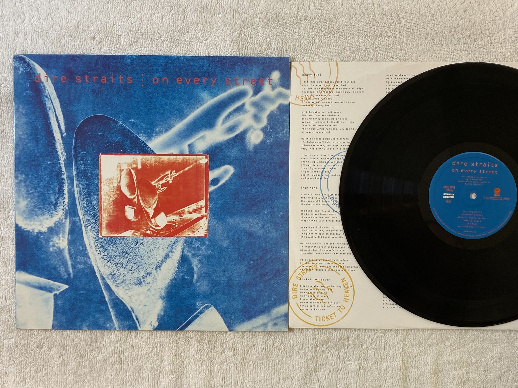 Omslagsbild för skivan DIRE STRAITS on every street LP -91 VERTIGO 510160-1