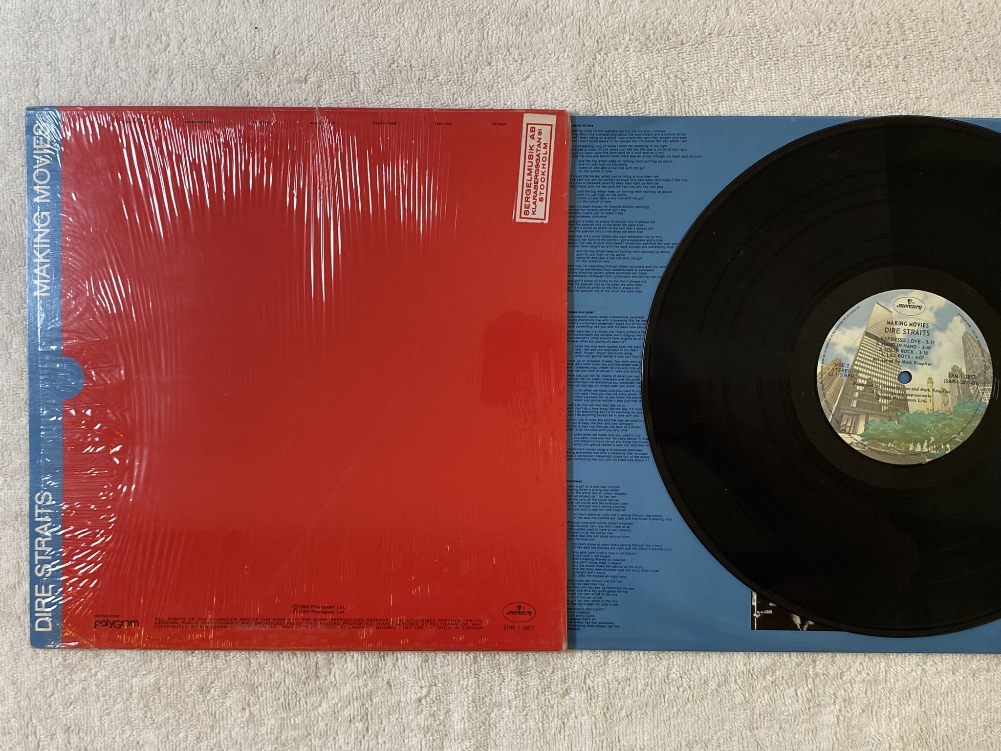 Omslagsbild för skivan DIRE STRAITS making movies LP -80 Can MERCURY SRM-1-3857