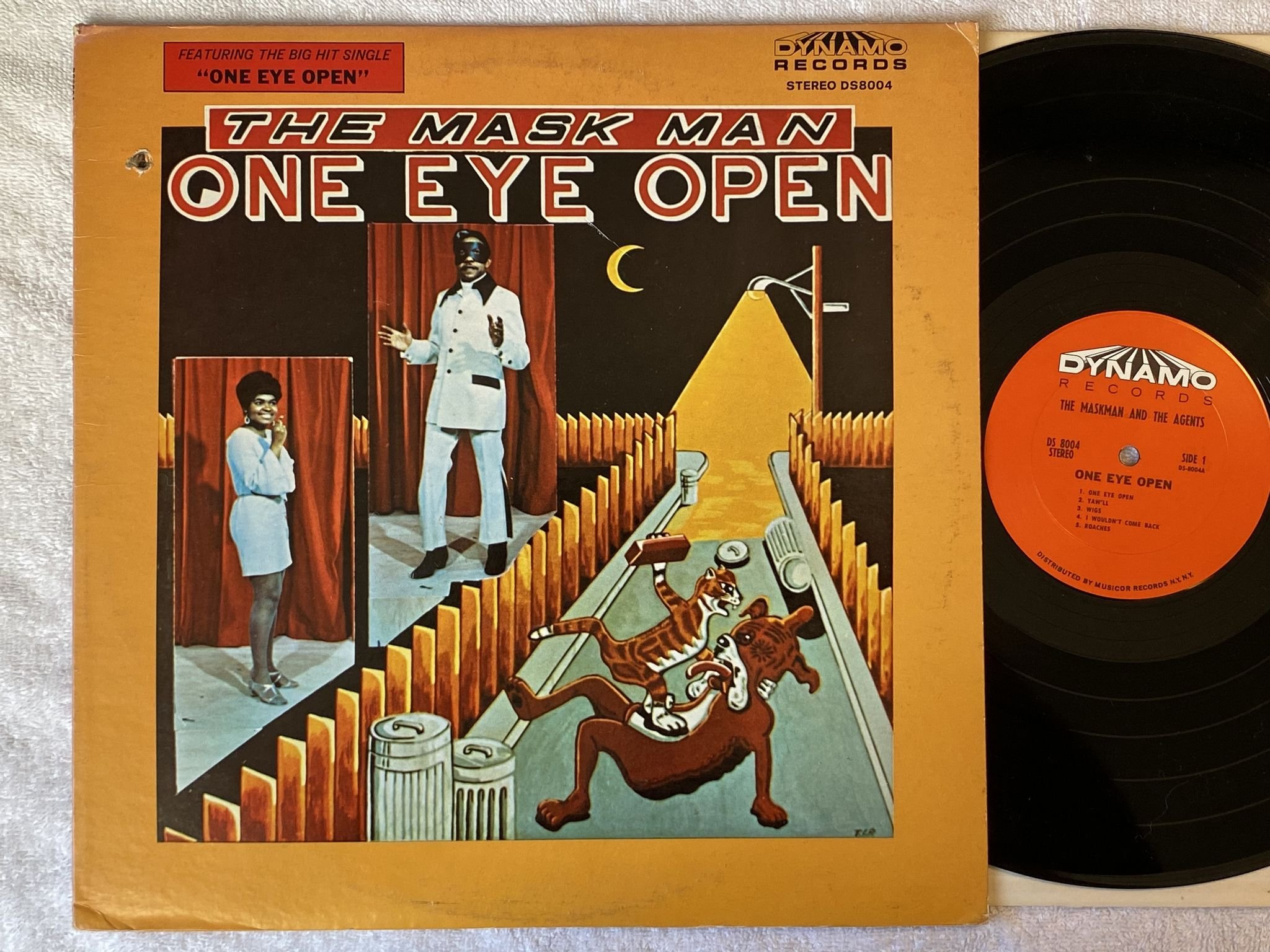 Omslagsbild för skivan THE MASKMAN AND THE AGENTS one eye open LP -69 US DYNAMO DS 8004