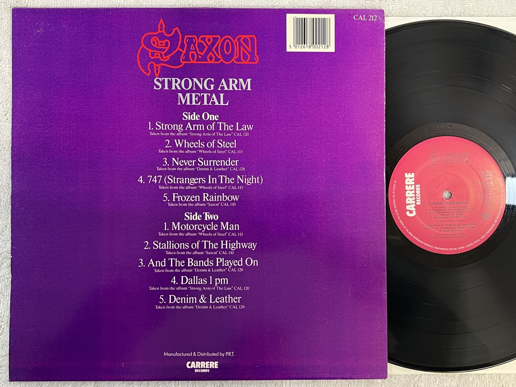 Omslagsbild för skivan SAXON strong arm metal LP -84 UK CARRERE CAL 212