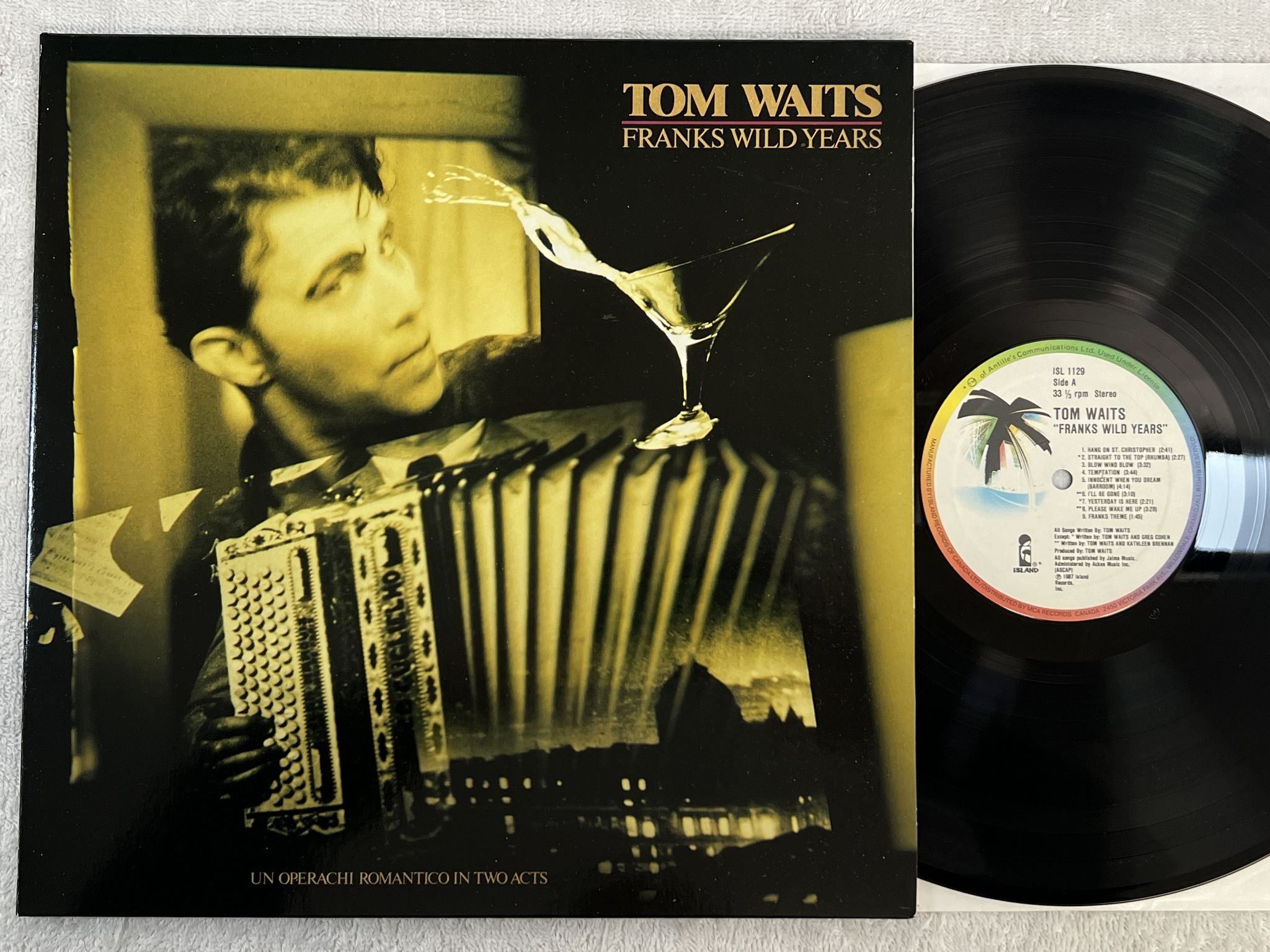 Omslagsbild för skivan TOM WAITS Franks wild years LP -87 Can ISLAND ISL 1129
