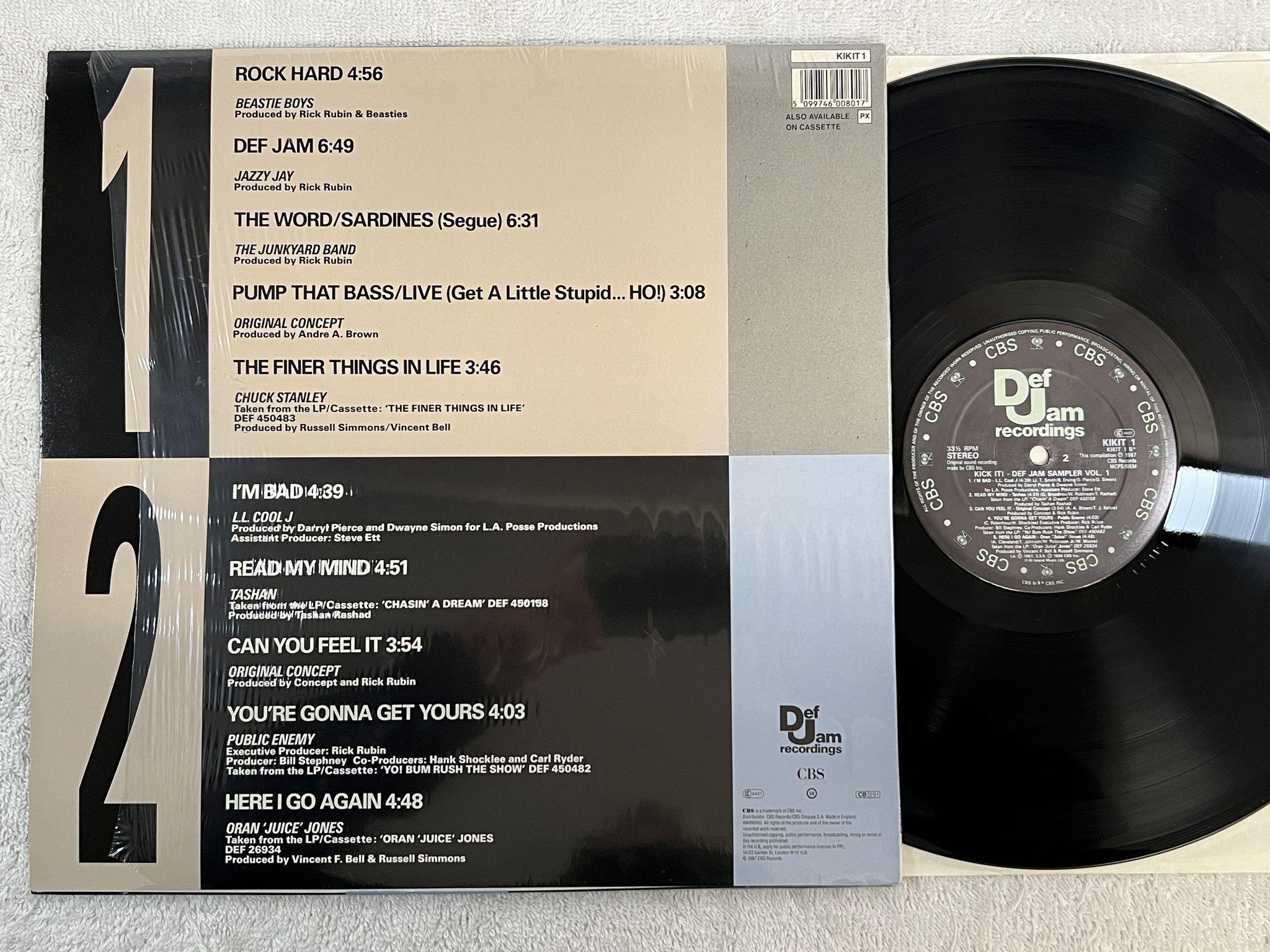 Omslagsbild för skivan V/A Kick it! Def Jam Sampler vol 1 LP -87 UK KUKIT-1 *** INCL PATCH ***