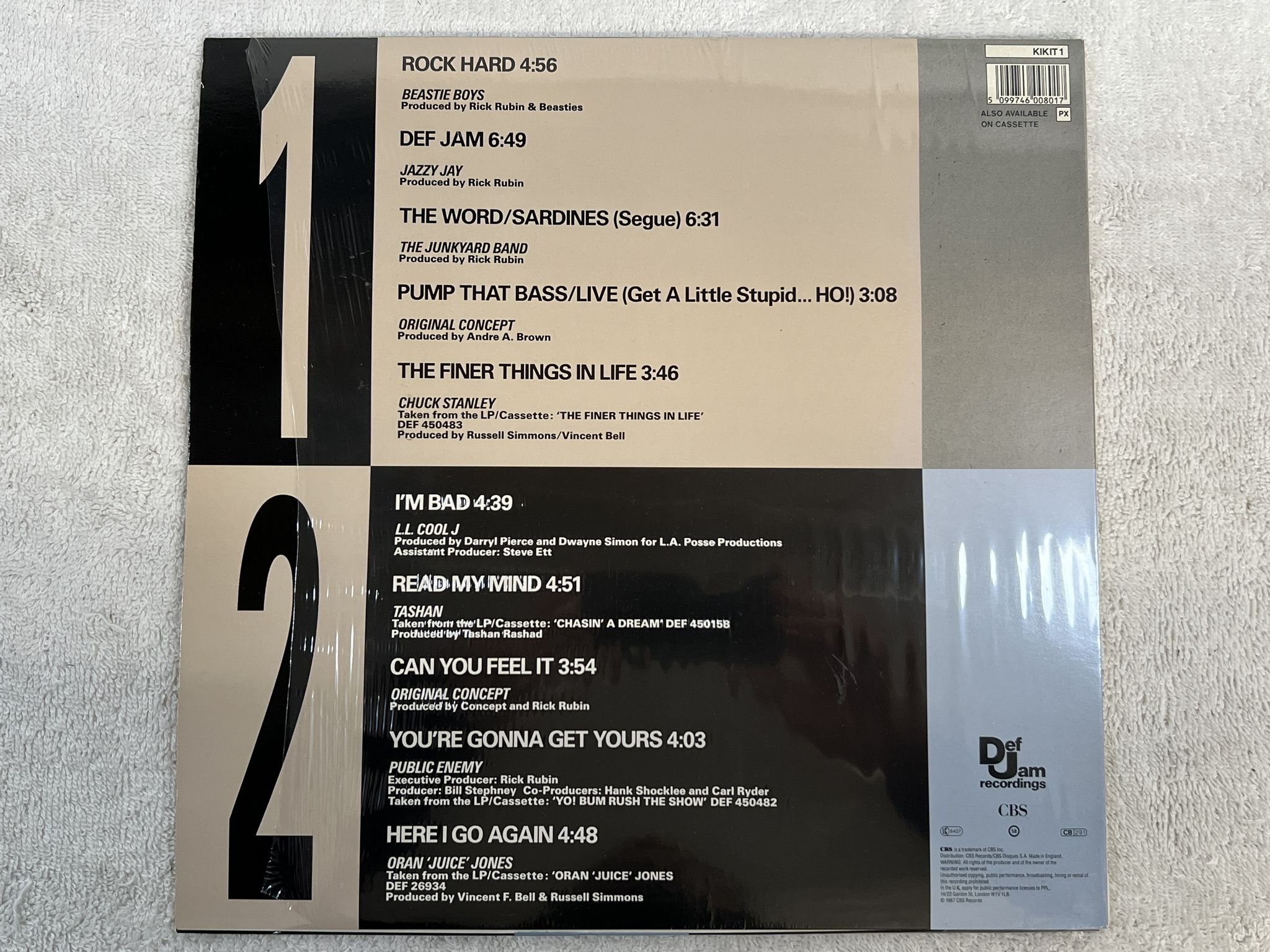 Omslagsbild för skivan V/A Kick it! Def Jam Sampler vol 1 LP -87 UK KUKIT-1 *** INCL PATCH ***