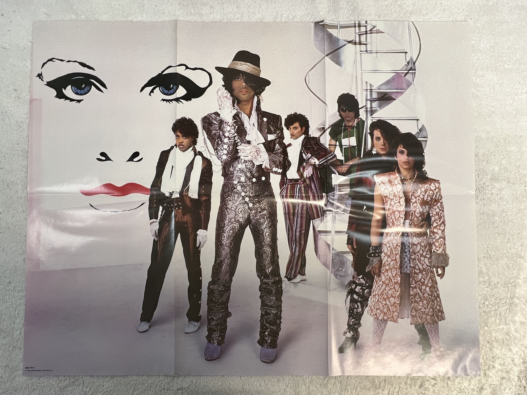 Omslagsbild för skivan PRINCE AND THE REVOLUTION purple rain LP -84 WARNER 925 110-1 ** w/ Poster **