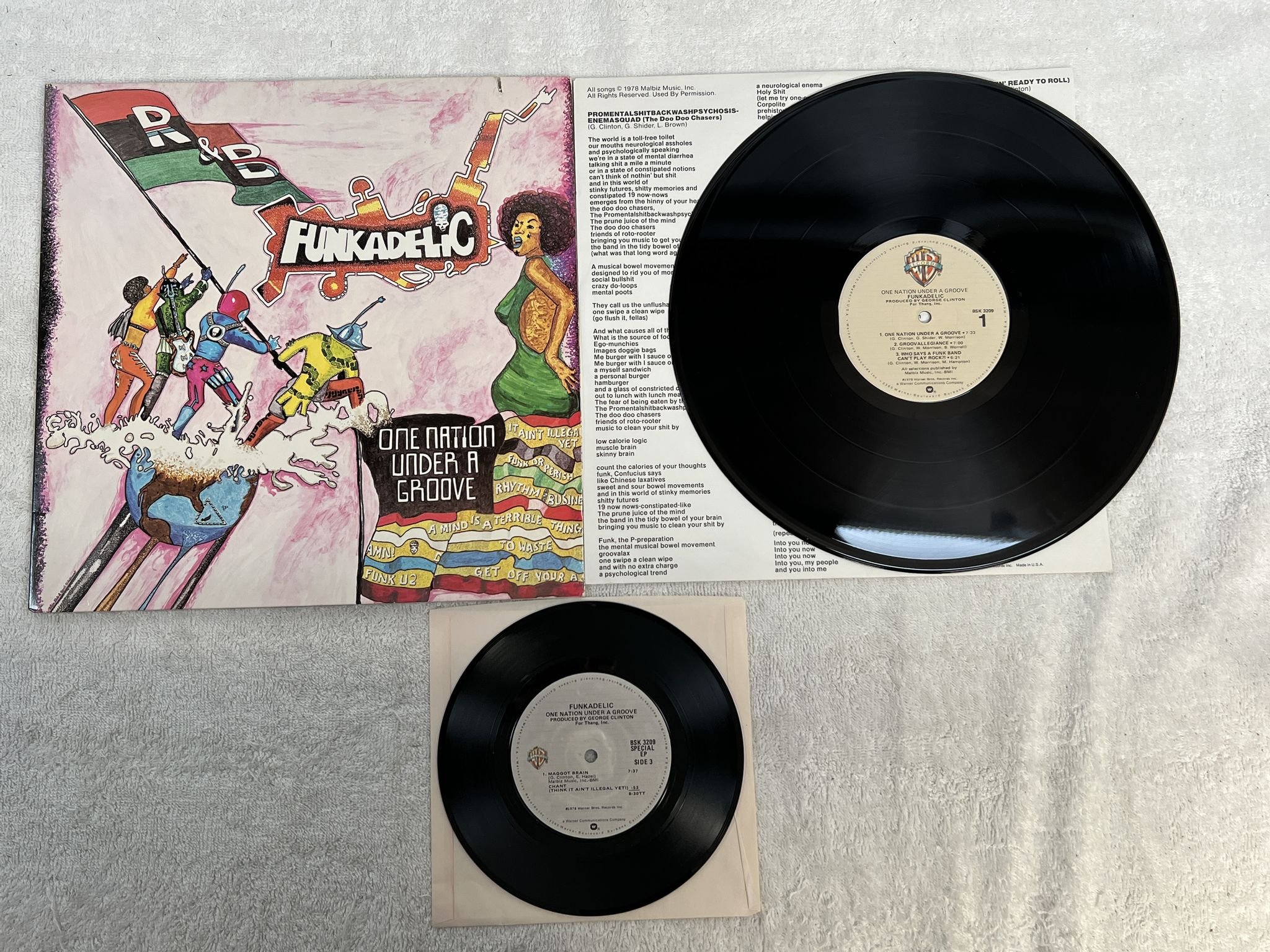 Omslagsbild för skivan FUNKADELIC one nation under a groove LP + 7"single -78 US WARNER BROS BSK 3209