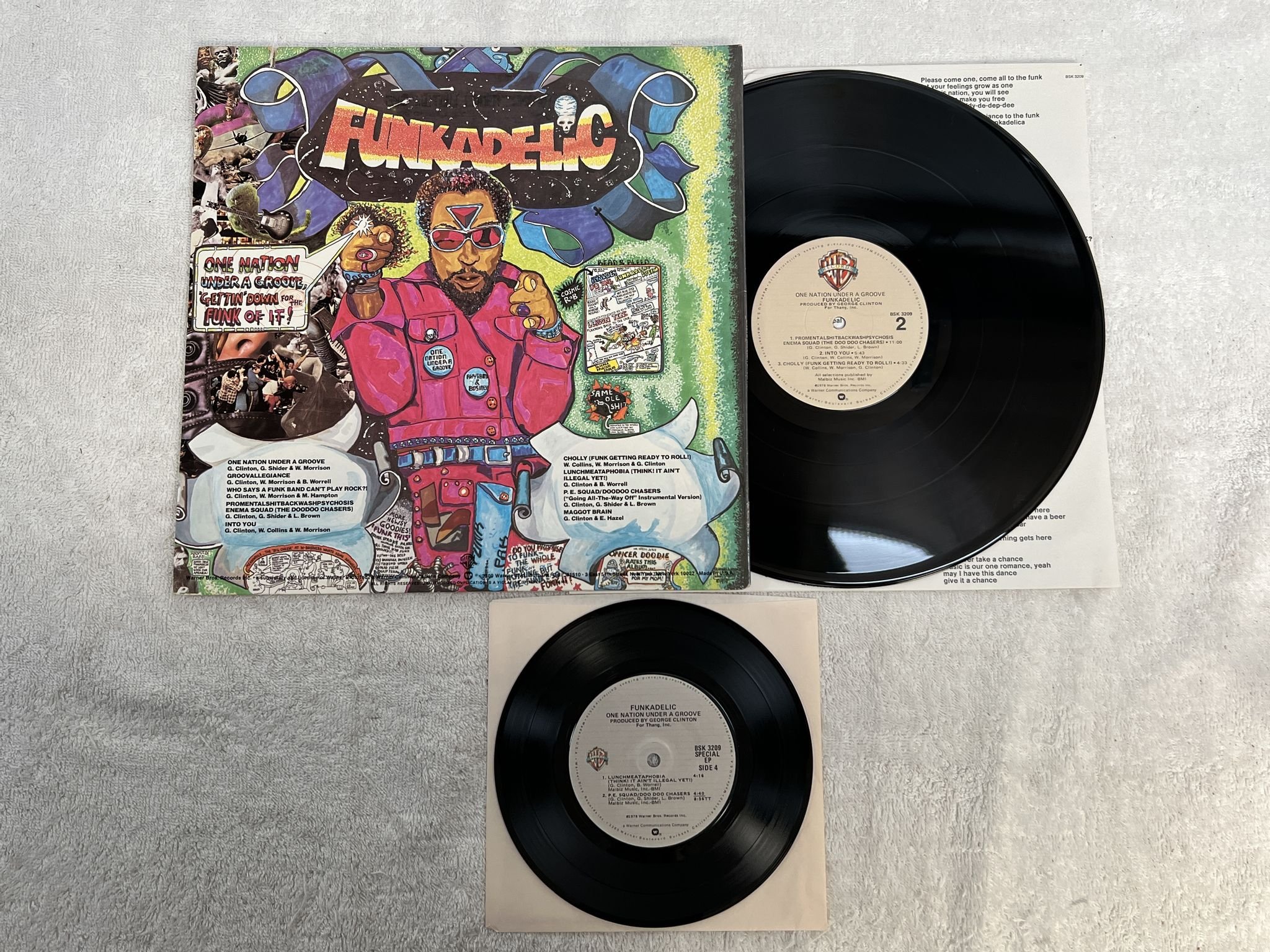 Omslagsbild för skivan FUNKADELIC one nation under a groove LP + 7"single -78 US WARNER BROS BSK 3209