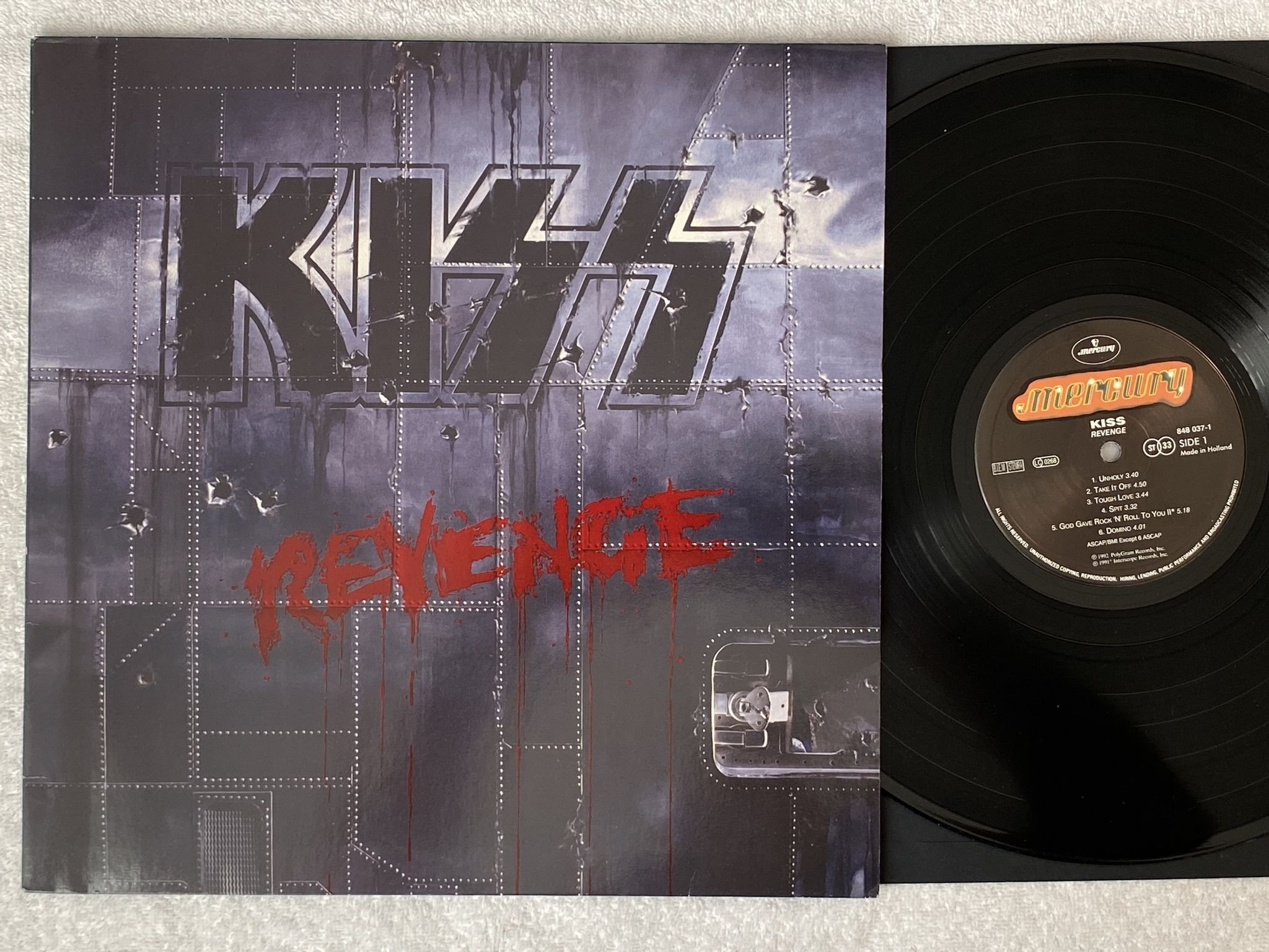 Omslagsbild för skivan KISS revenge LP -92 Hol MERCURY 848 037-1 ***** R A R E *****