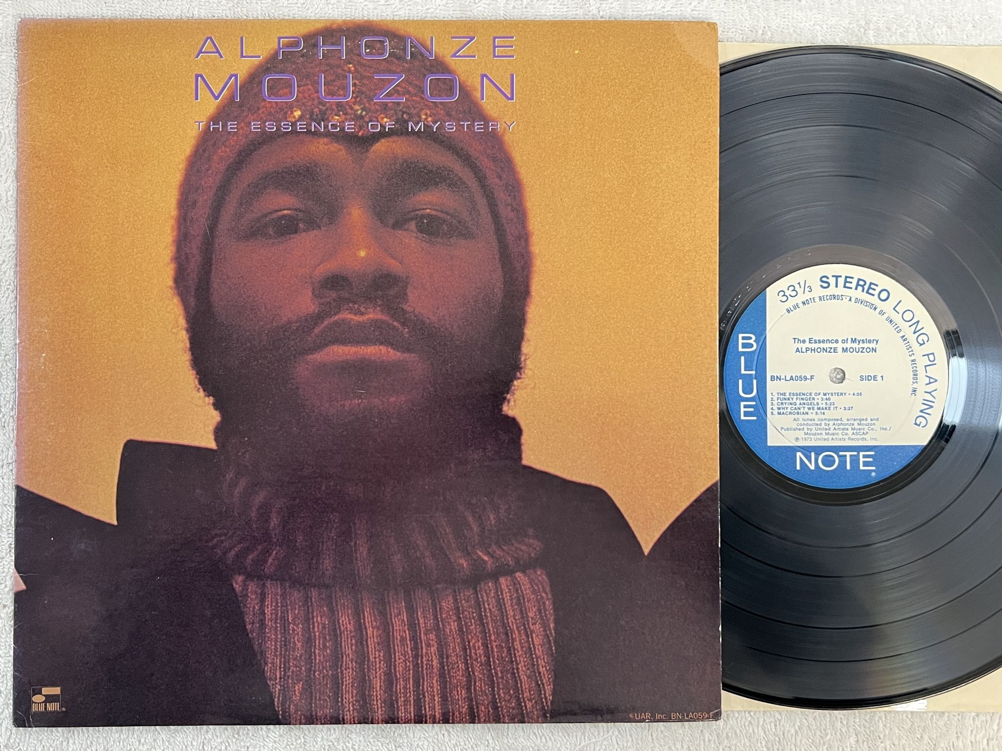 Omslagsbild för skivan ALPHONSE MOUZON The Essence Of Mystery LP -73 US BLUE NOTE BN-LA059-F ** Yeah **