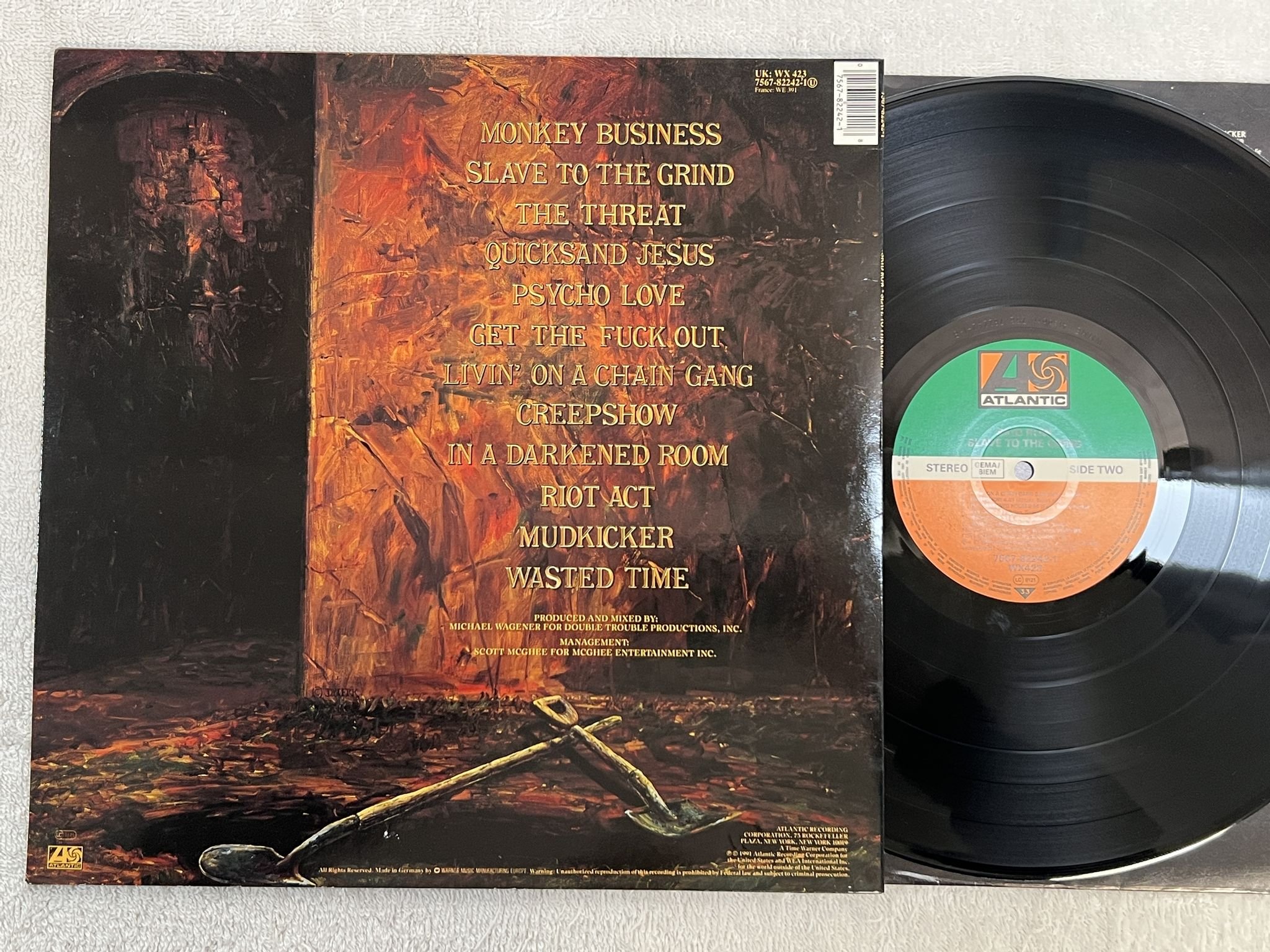 Omslagsbild för skivan SKID ROW slave to the grind LP -91 Ger ATLANTIC 7567-82242-1