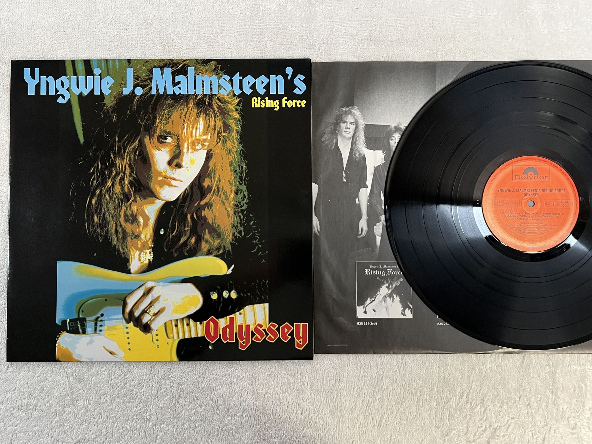 Omslagsbild för skivan YNGWIE J MALMSTEEN'S RISING FORCE odyssey LP -88 Ger POLYDOR 835 451-1