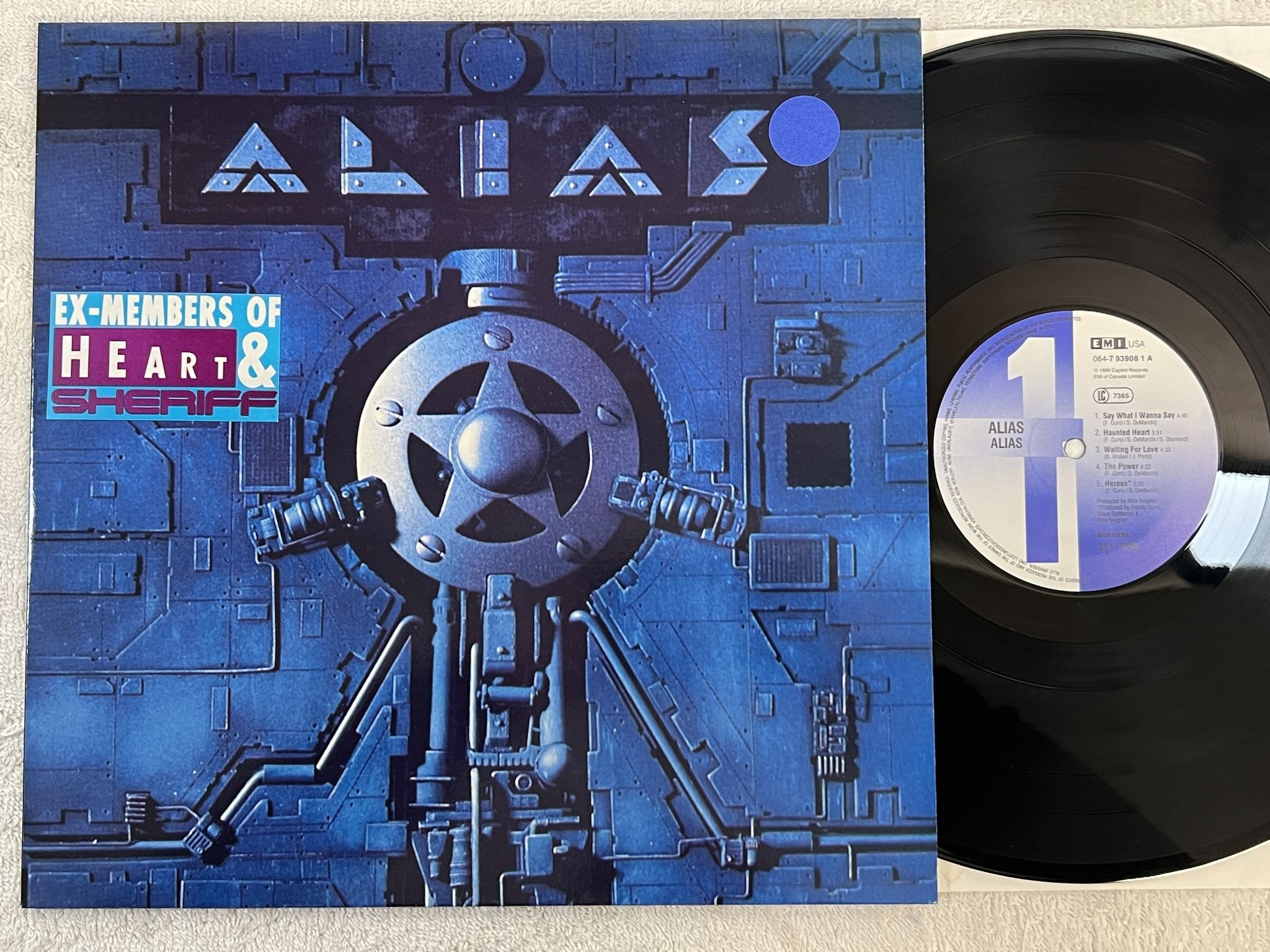 Omslagsbild för skivan ALIAS s/t LP -90 Ger EMI USA 064-7 93908 1