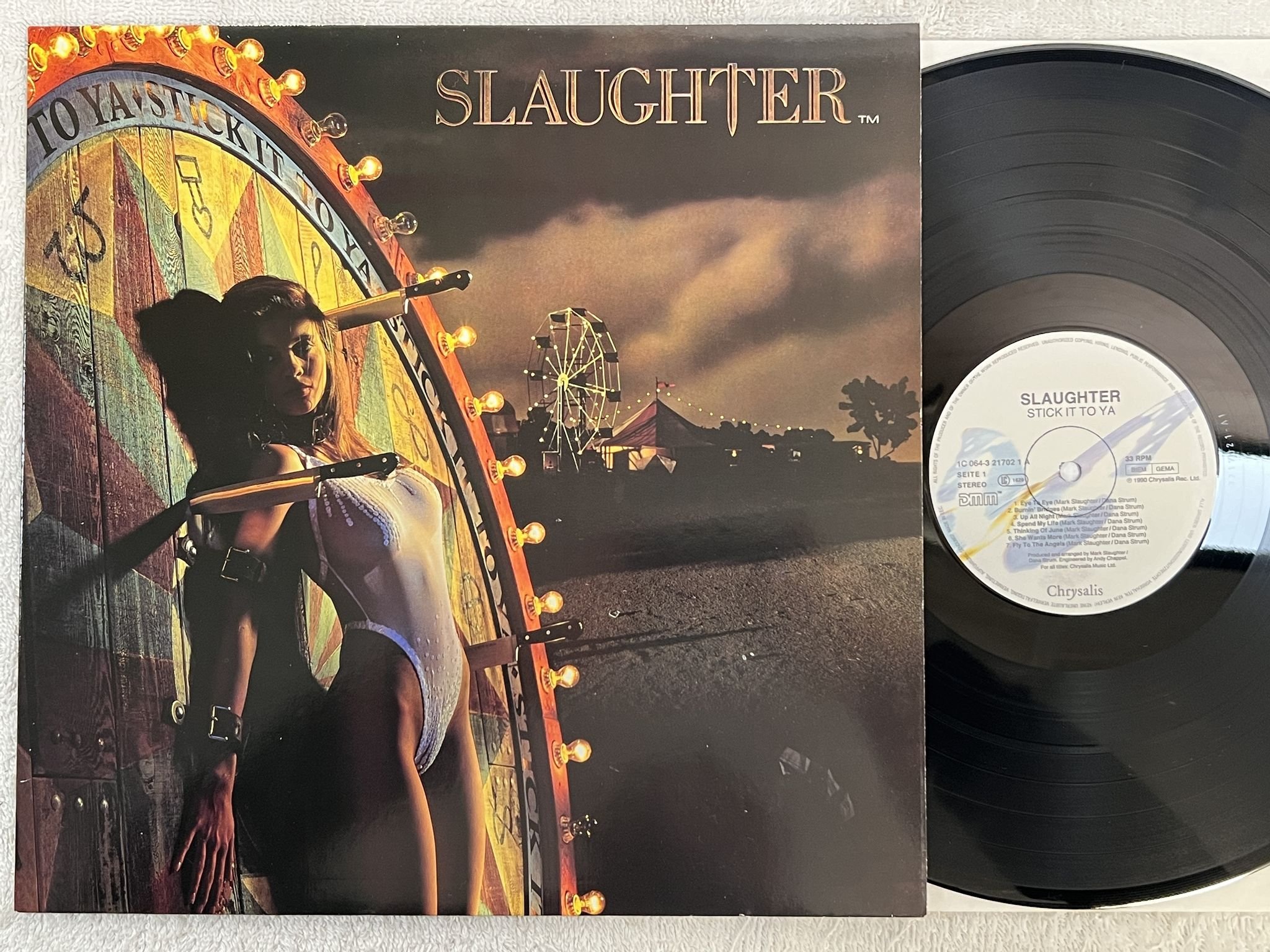 Omslagsbild för skivan SLAUGHTER stick it to ya LP -90 Ger CHRYSALIS 1C 064 3217021