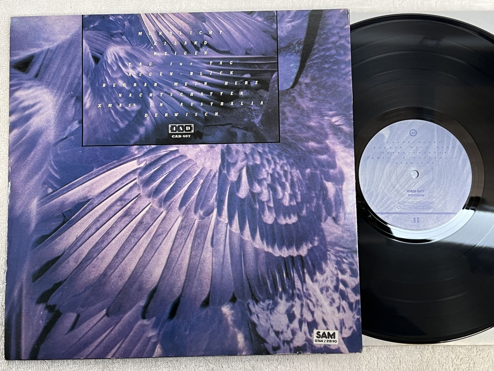 Omslagsbild för skivan X Mal Deutschland Tocsin LP -84 UK 4AD CAD 407 *** GOTH ROCK ***