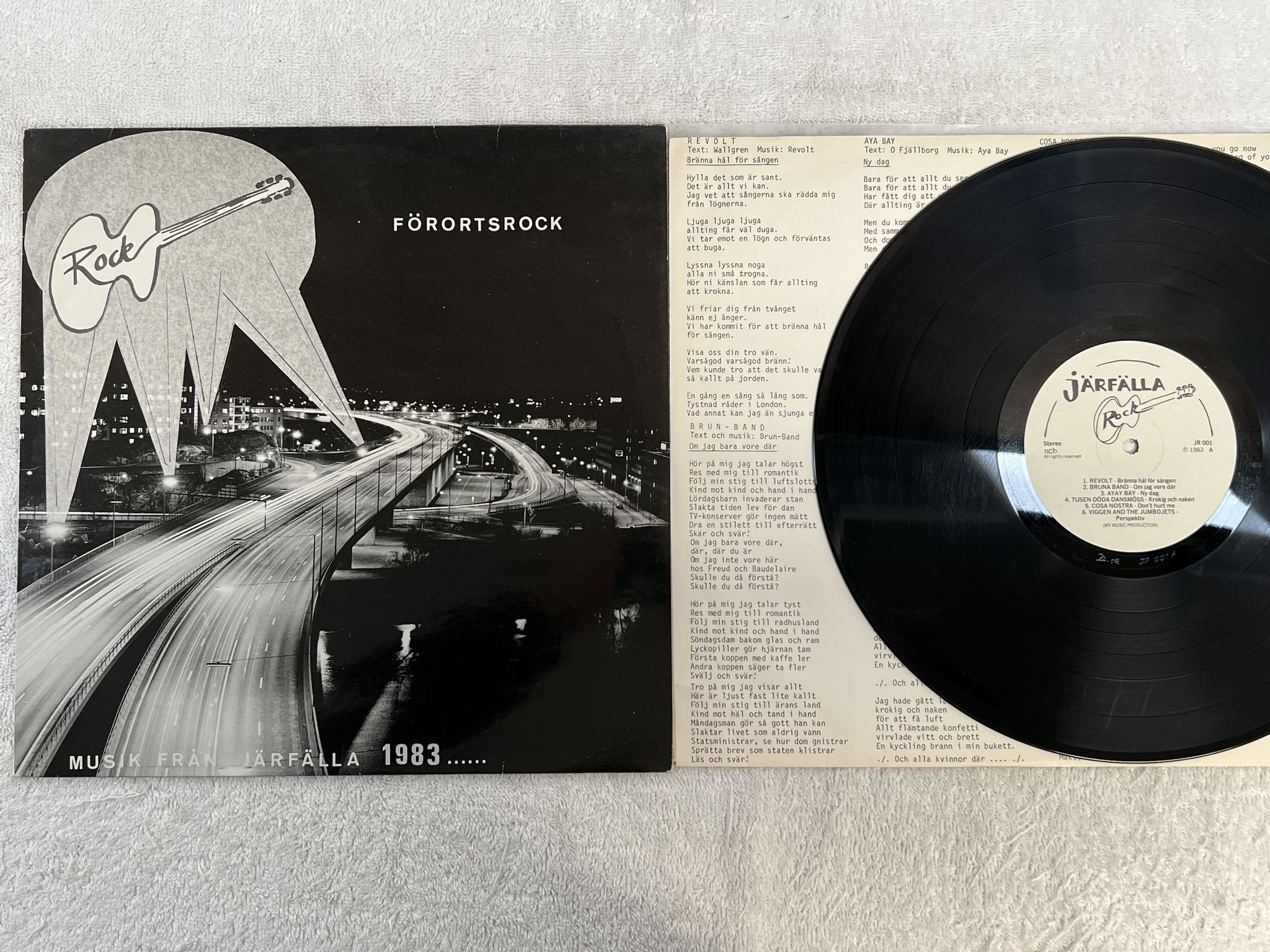 Omslagsbild för skivan V/A förorts rock LP -83 Swe JÄRFÄLLA ROCK JR 001