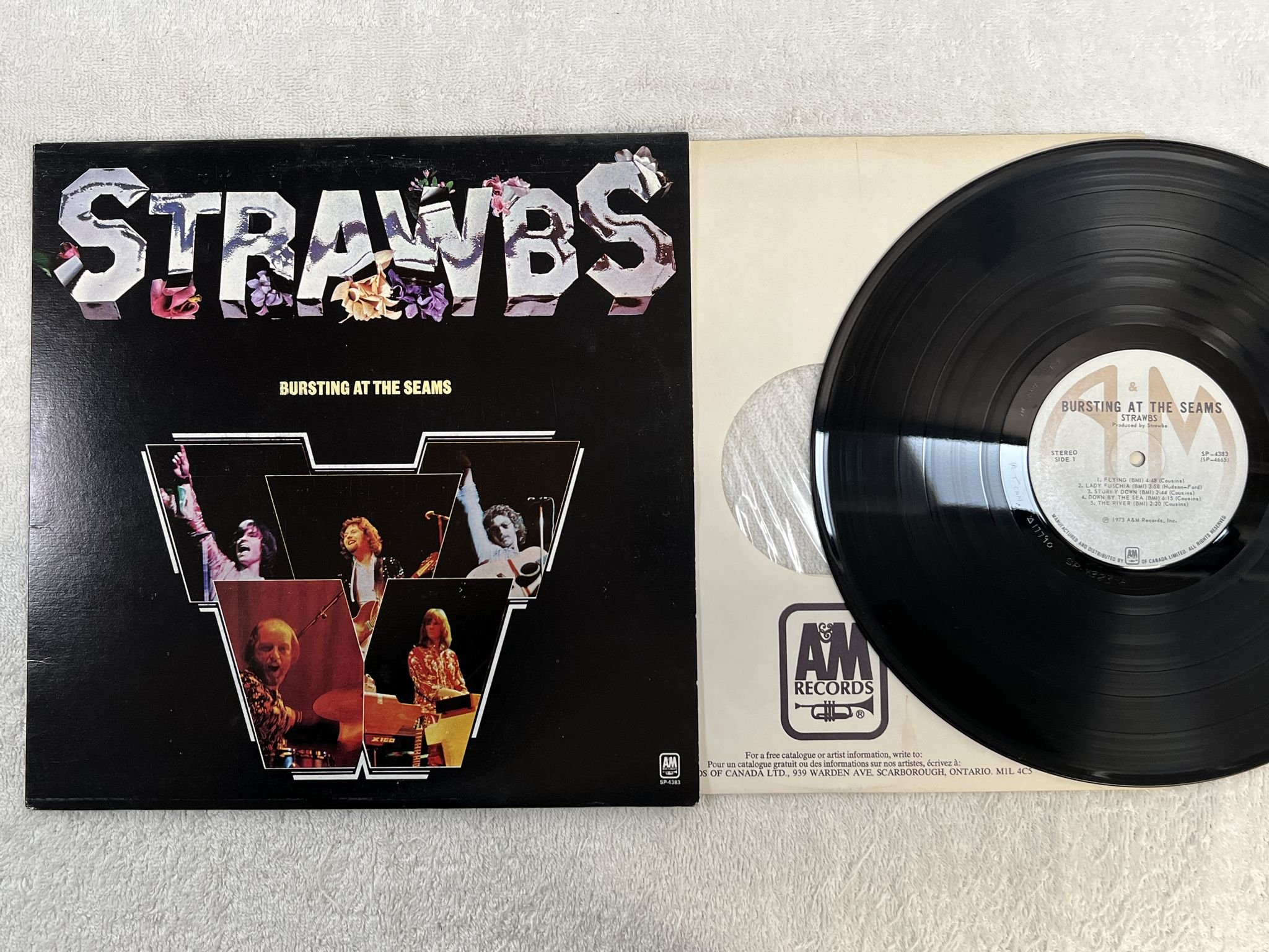 Omslagsbild för skivan STRAWBS bursting at the seams LP Can A&M SP-4383