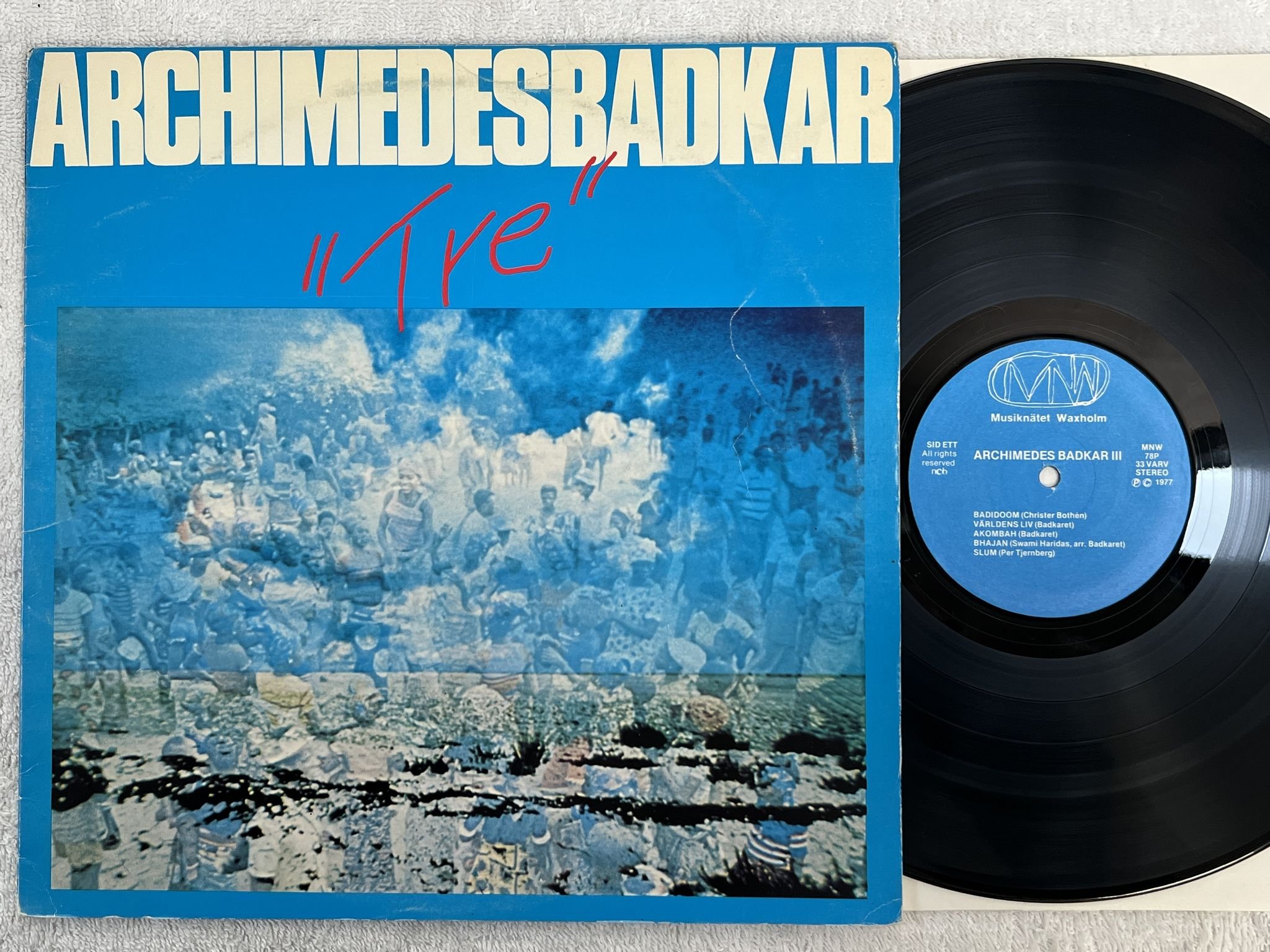 Omslagsbild för skivan ARCHIMEDES BADKAR tre LP -77 Swe MNW 78P *** world / prog ***