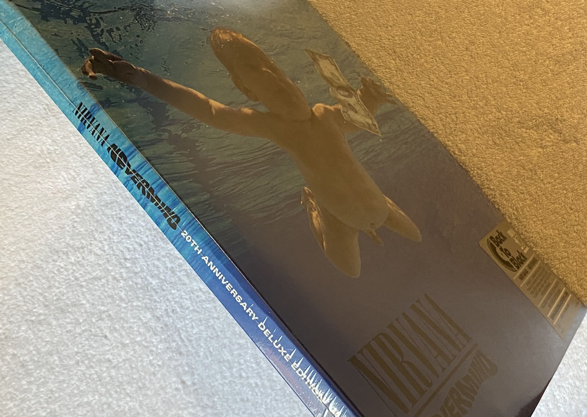 Omslagsbild för skivan NIRVANA nevermind 4xLP 2011 DGC 602527779041 *** SEALED DELUXE SET ***