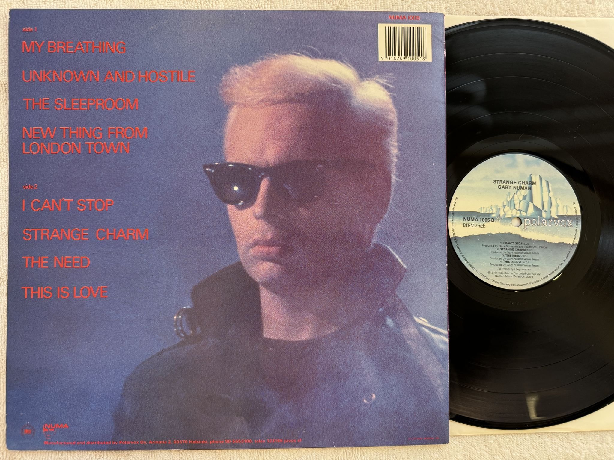 Omslagsbild för skivan GARY NUMAN strange charm LP -86 ncb POLARVOX NUMA 1005