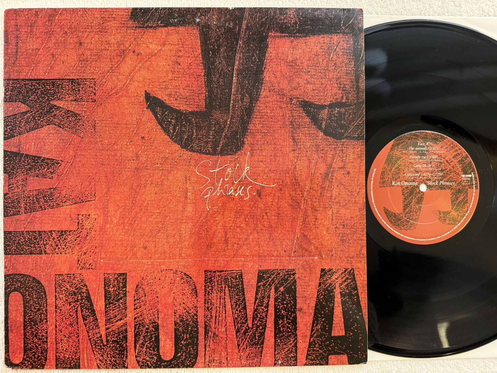 Omslagsbild för skivan KAT ONOMA Stock Phrases LP -89 Fra JUST'IN DISTRIBUTION JD 360286