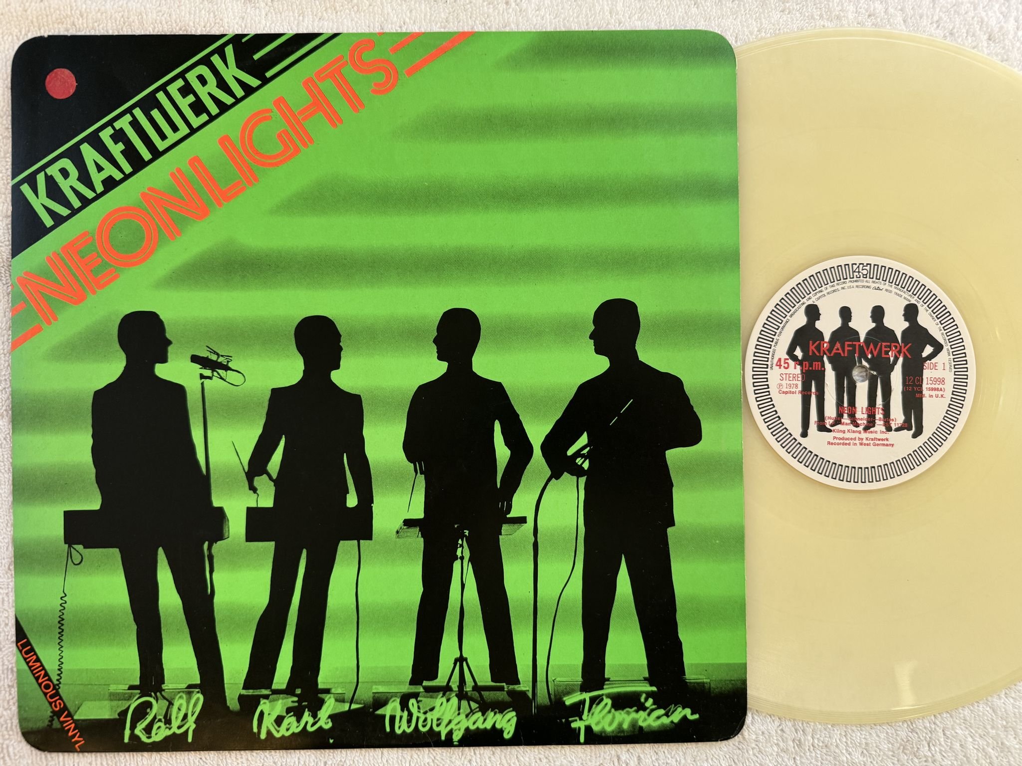 Omslagsbild för skivan KRAFTWERK neon lights 12" -78 US CAPITOL 12CL 15998 *** Luminous Vinyl ***