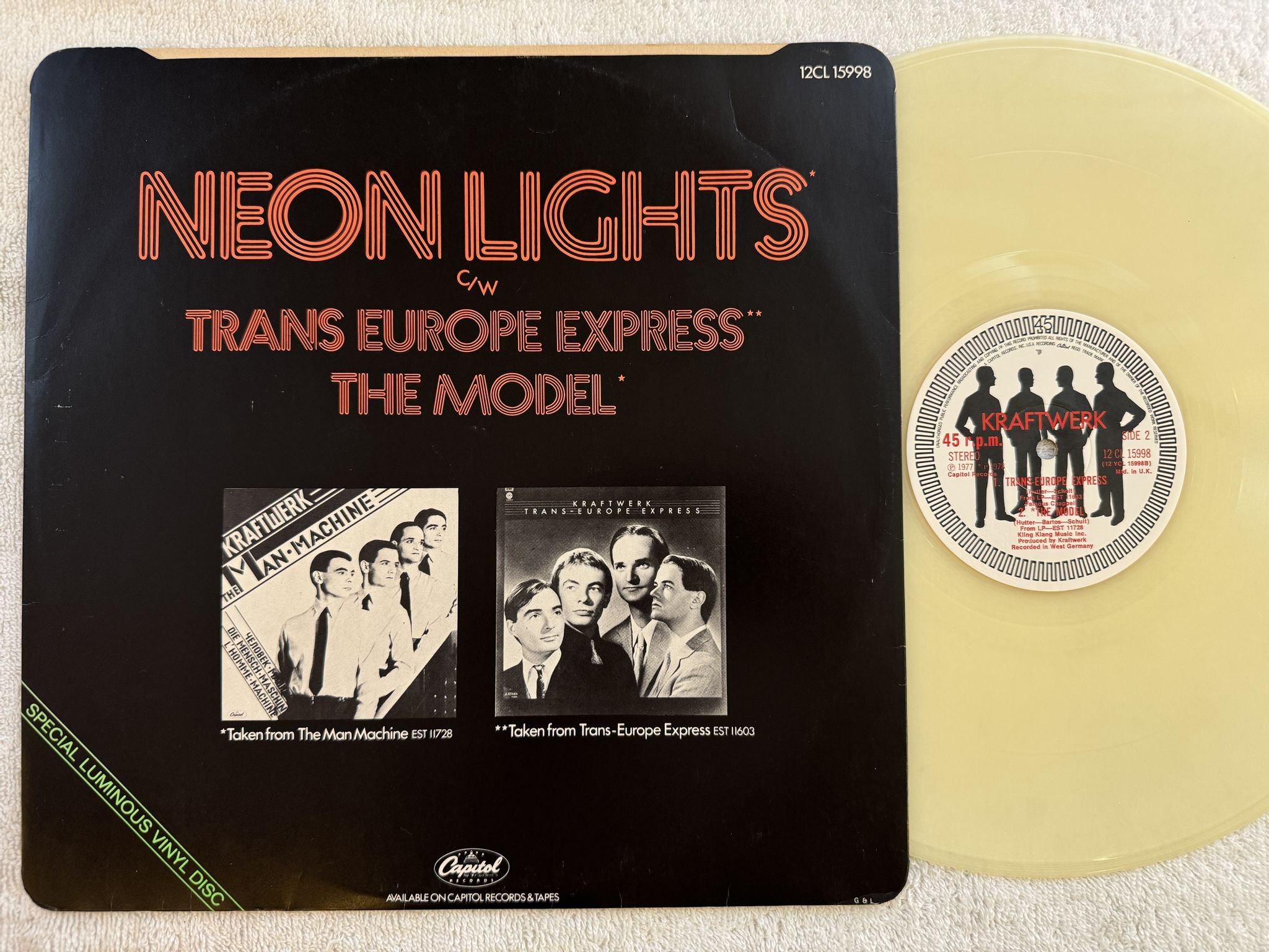 Omslagsbild för skivan KRAFTWERK neon lights 12" -78 US CAPITOL 12CL 15998 *** Luminous Vinyl ***