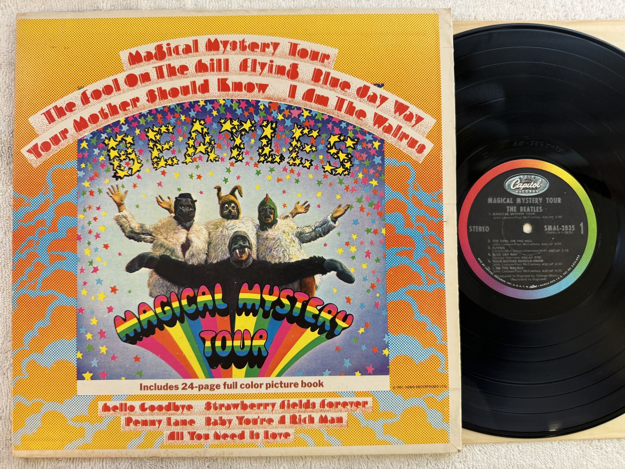 Omslagsbild för skivan THE BEATLES magical mystery tour LP re US CAPITOL SMAL-2835