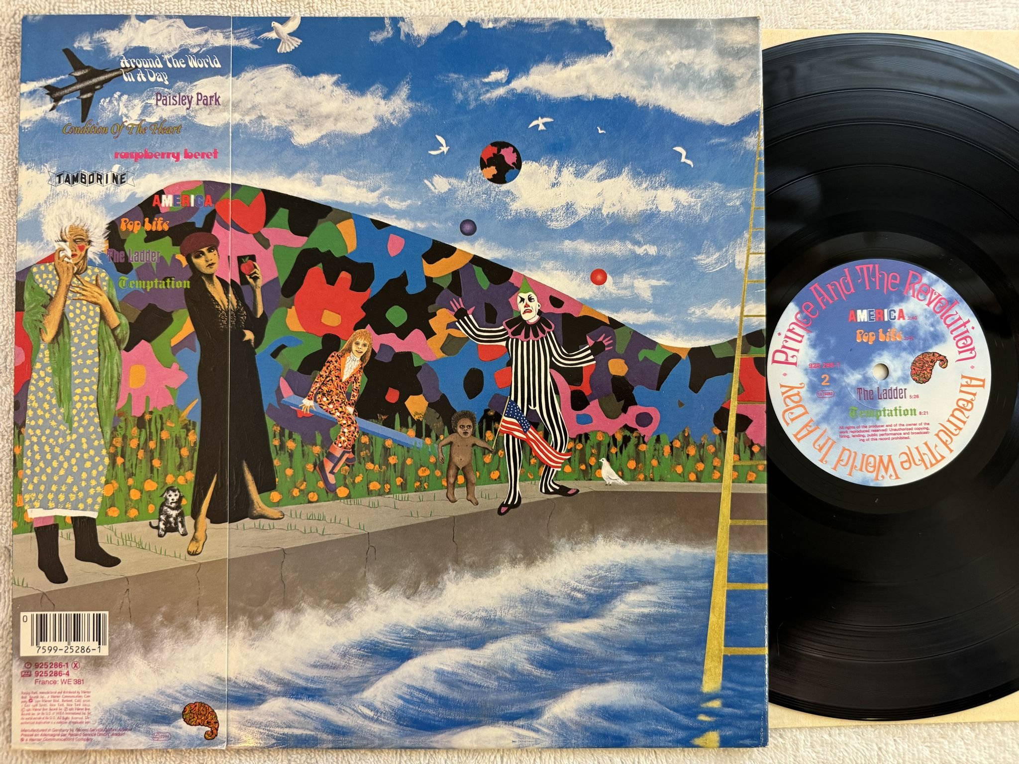 Omslagsbild för skivan PRINCE & THE REVOLUTION around the world in a day LP -85 PAISLEY PARK 925 286-1