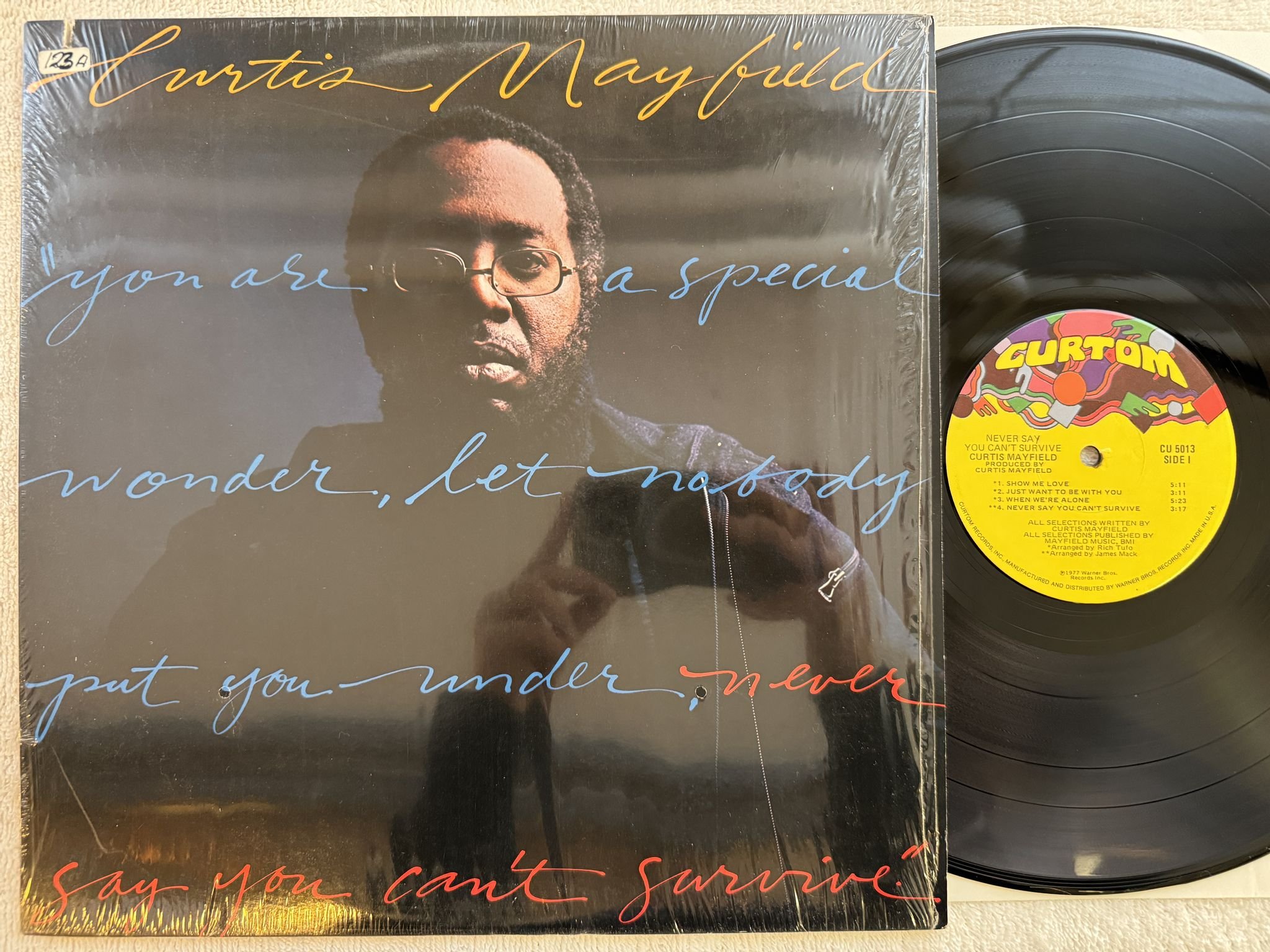 Omslagsbild för skivan CURTIS MAYFIELD never say you can't survive LP -77 US CURTOM CU 5013
