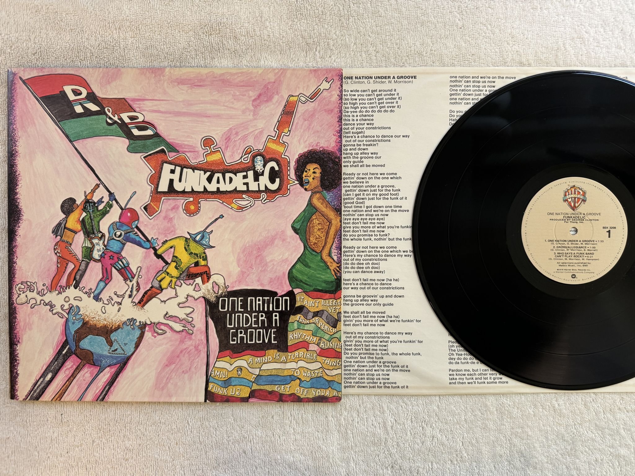 Omslagsbild för skivan FUNKADELIC one nation under a groove LP + 7" -78 US WARNER BSK 3209 ** KILLER **