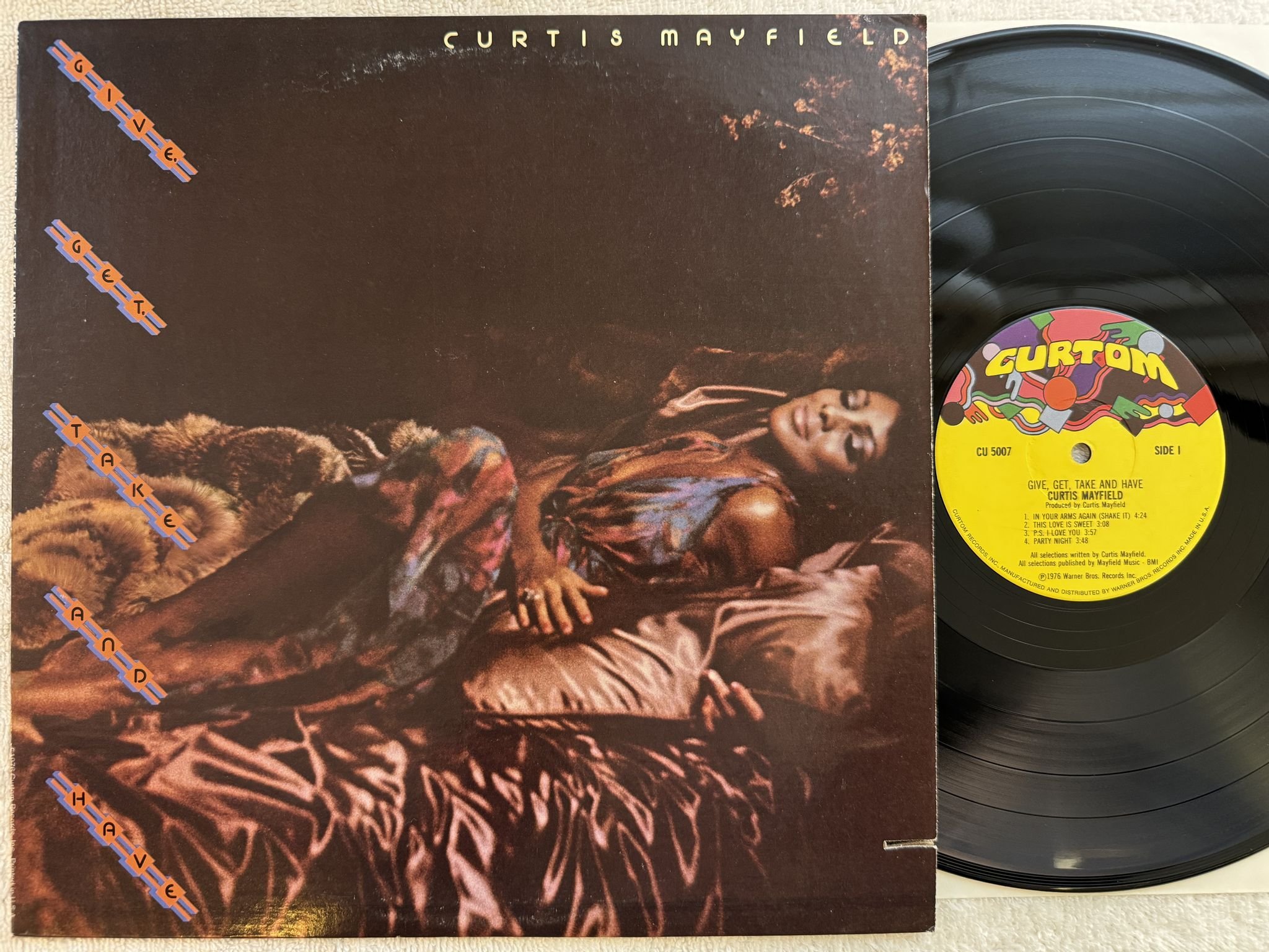 Omslagsbild för skivan CURTIS MAYFIELD give, get, take & have LP -76 US CURTOM CU 5007