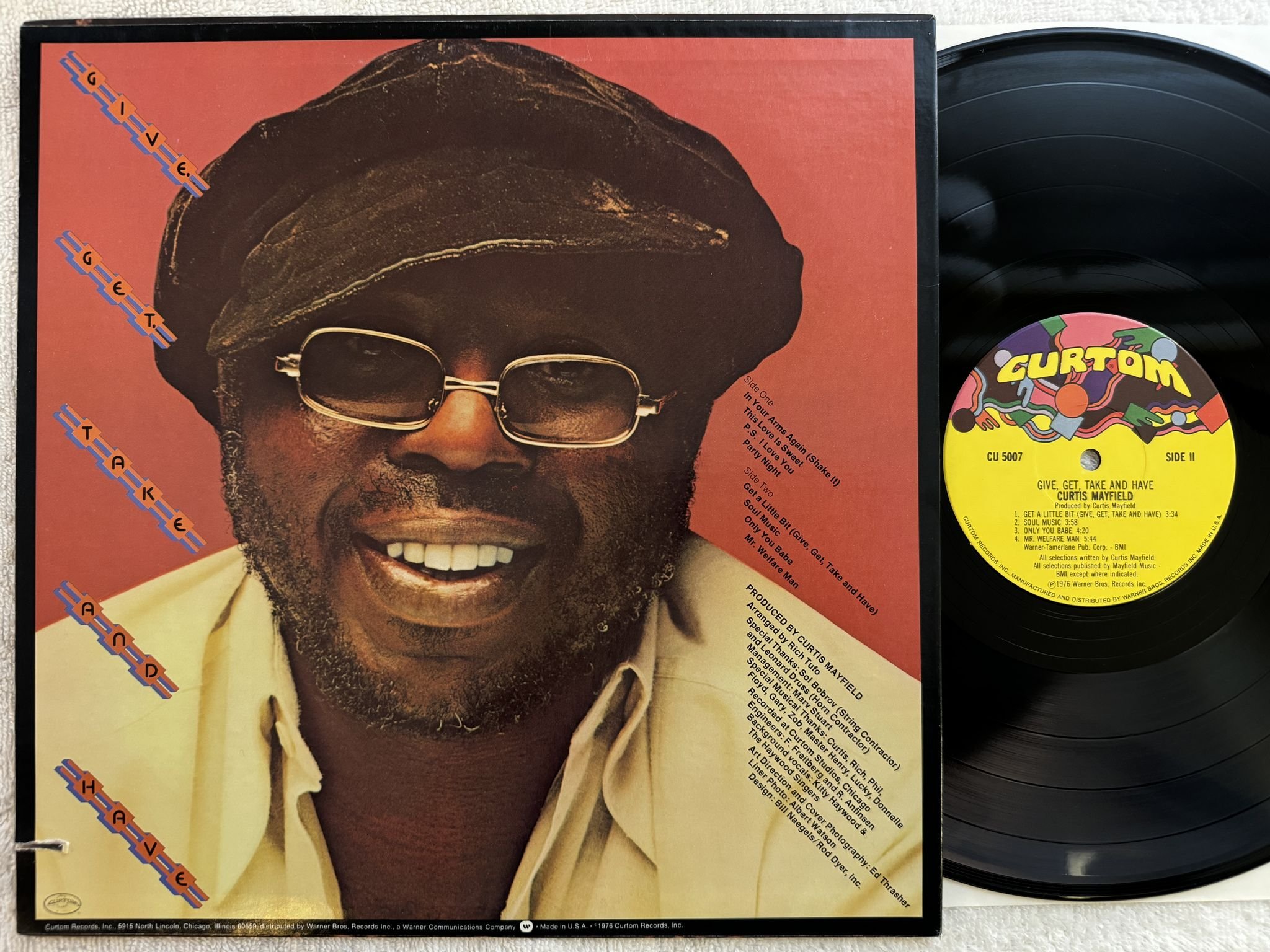 Omslagsbild för skivan CURTIS MAYFIELD give, get, take & have LP -76 US CURTOM CU 5007