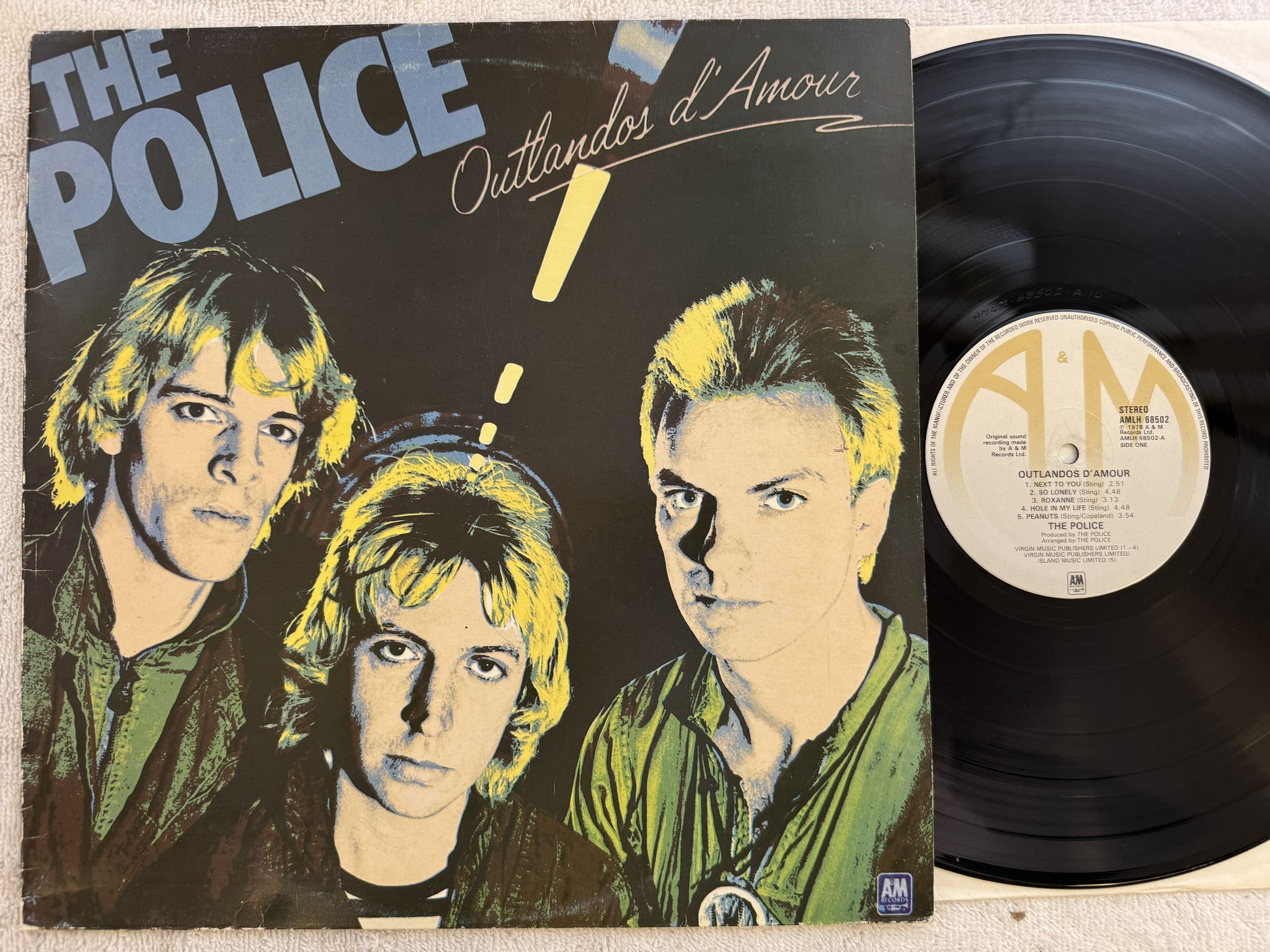 Omslagsbild för skivan POLICE outlandos d'amour LP -78 A&M AMLH 68502
