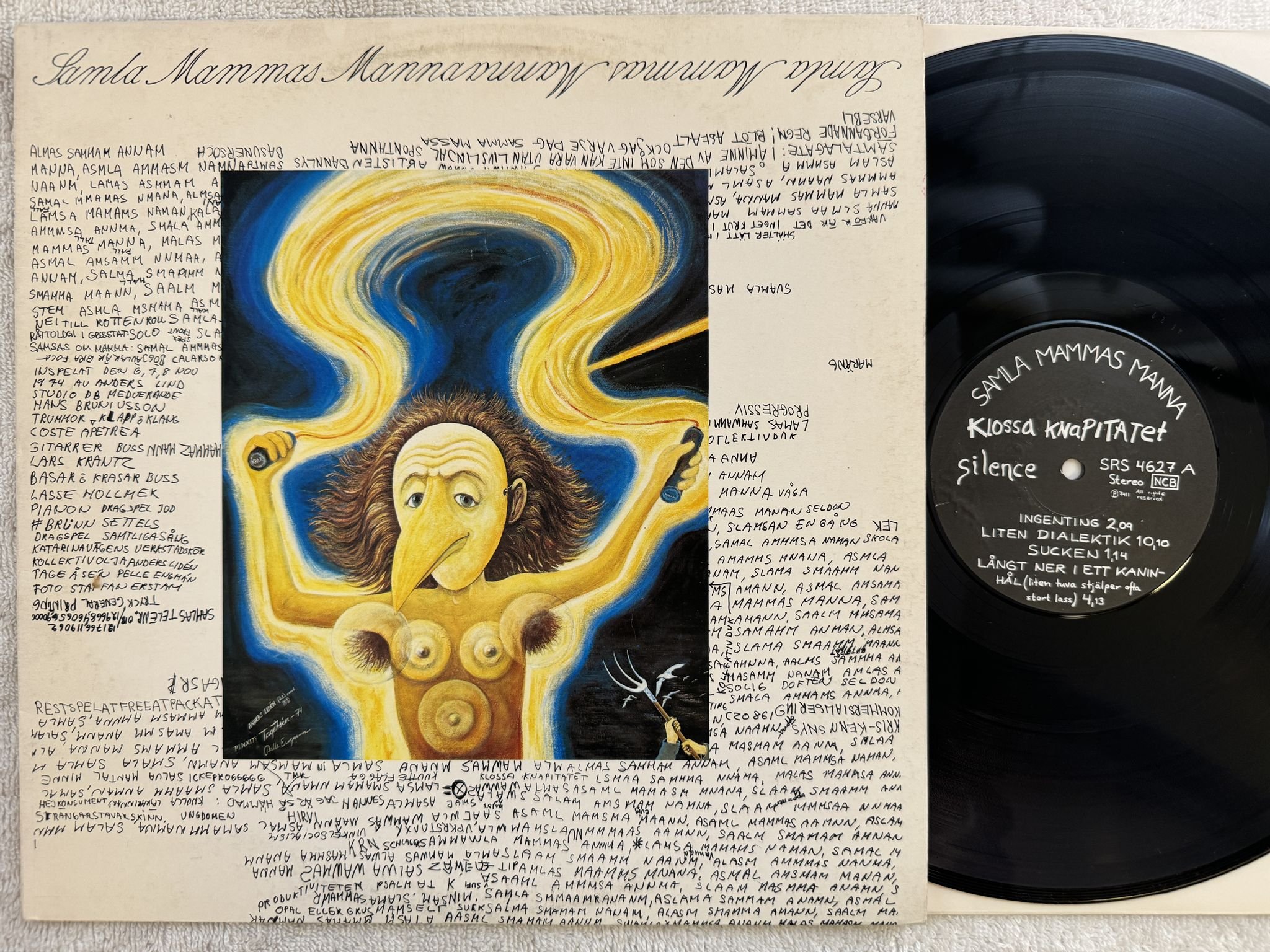 Omslagsbild för skivan SAMLA MAMMAS MANNA Klossa Knapitatet LP re Swe SILENCE SRS 4627