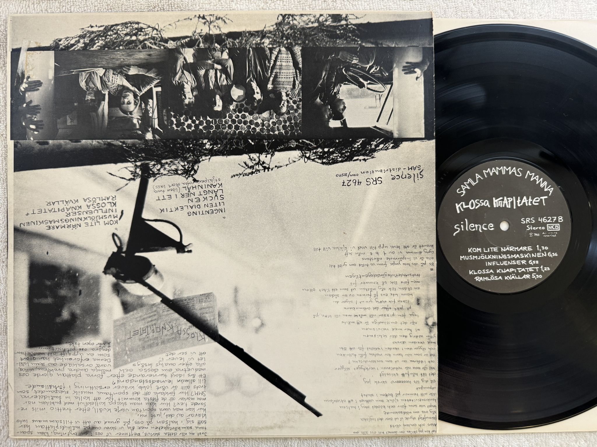 Omslagsbild för skivan SAMLA MAMMAS MANNA Klossa Knapitatet LP re Swe SILENCE SRS 4627