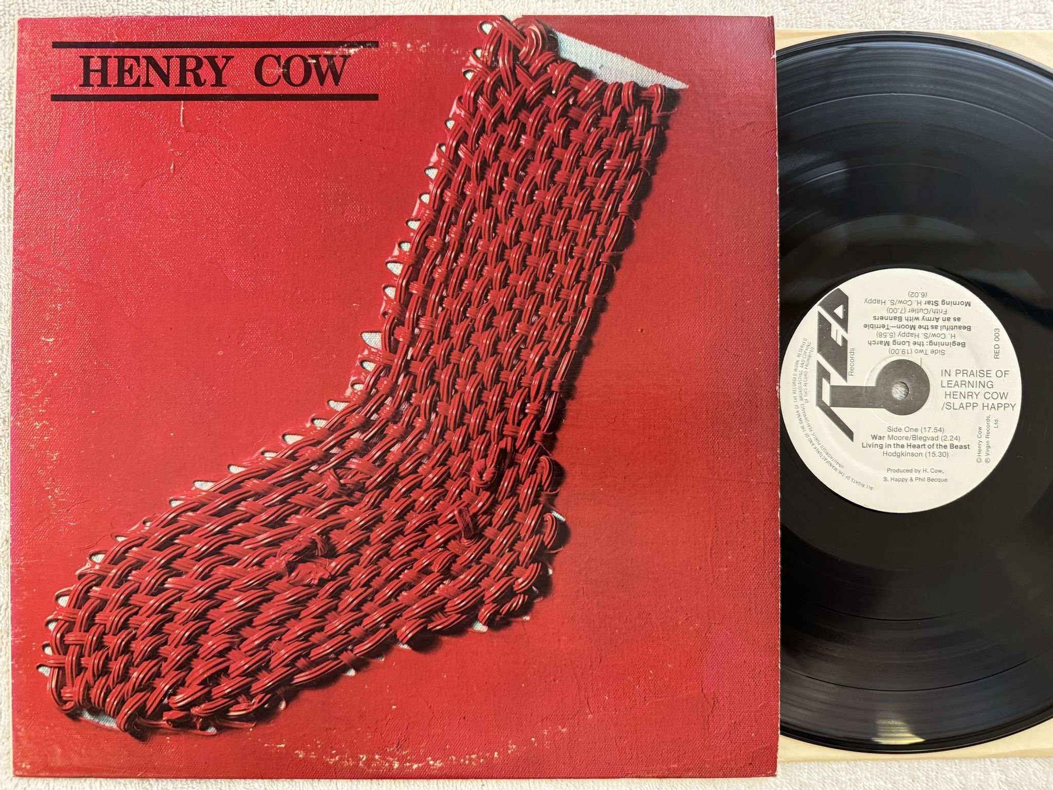 Omslagsbild för skivan HENRY COW In Praise Of Learning LP -75 US RED RED 003