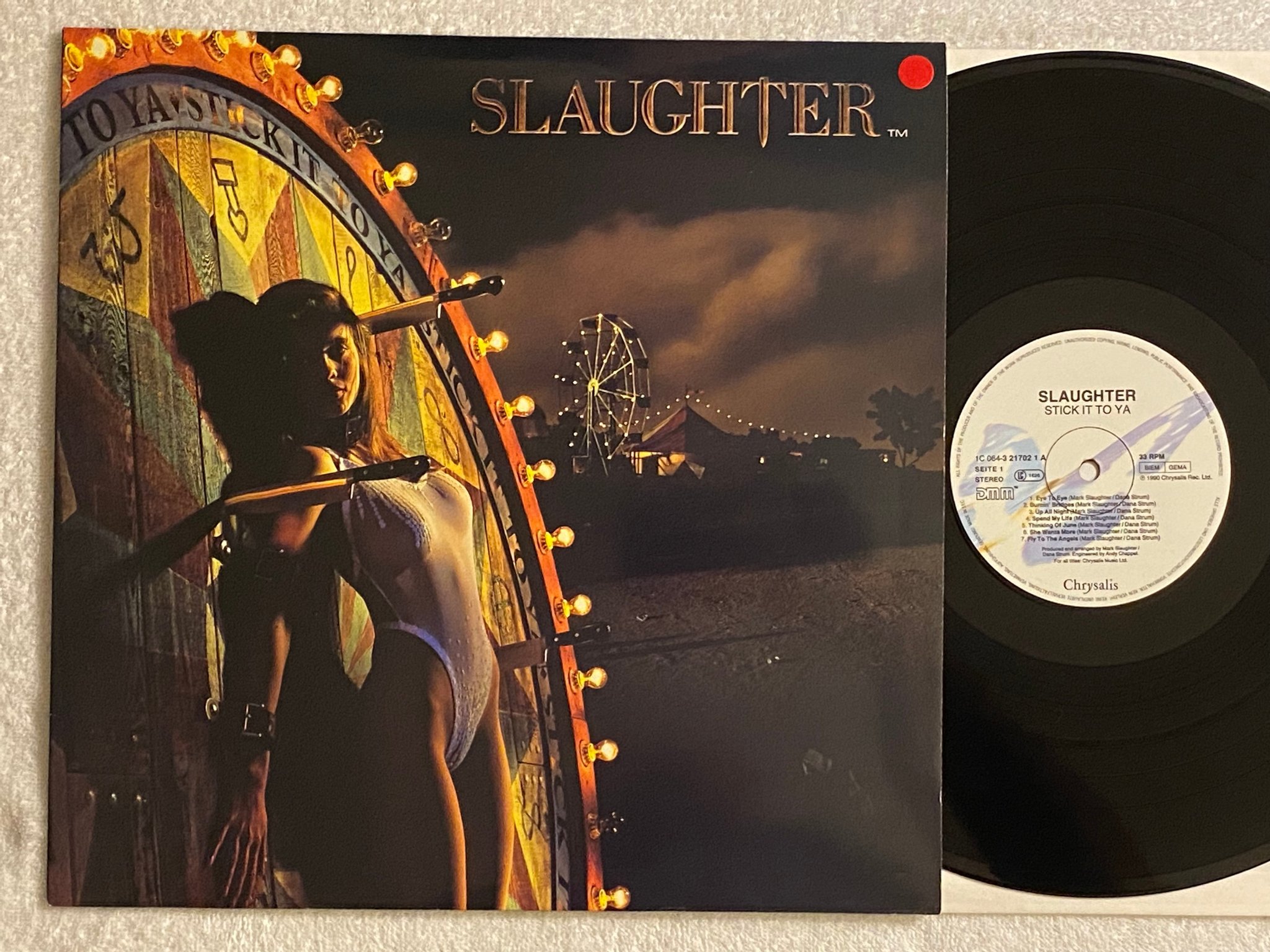 Omslagsbild för skivan SLAUGHTER stick it to ya LP -90 GER CHRYSALIS 1C 064-3217021