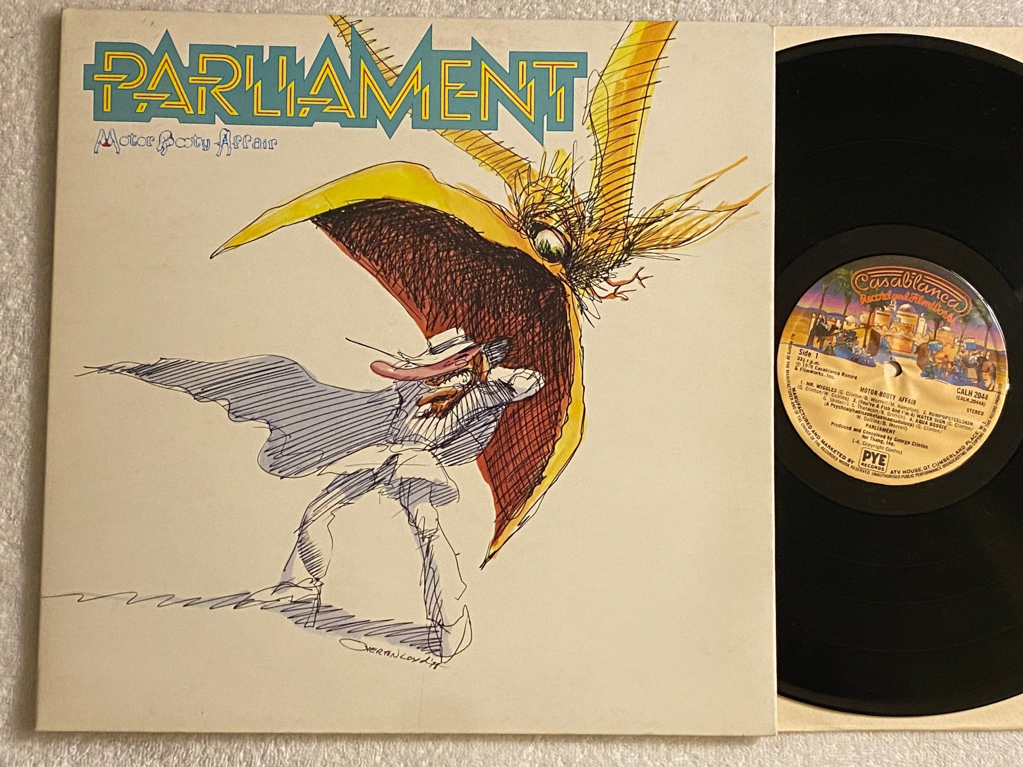 Omslagsbild för skivan PARLIAMENT motor-booty affair LP -78 UK CASABLANCA CALH 2044