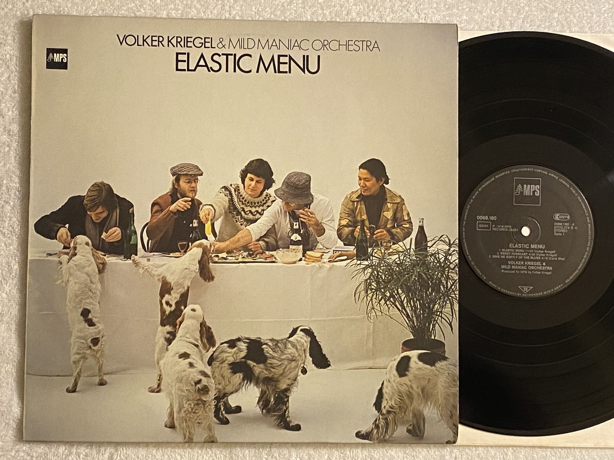 Omslagsbild för skivan VOLKER KRIEGEL & MILD MANIAC ORCHESTRA elastic menu LP -78 Ger MPS 15517